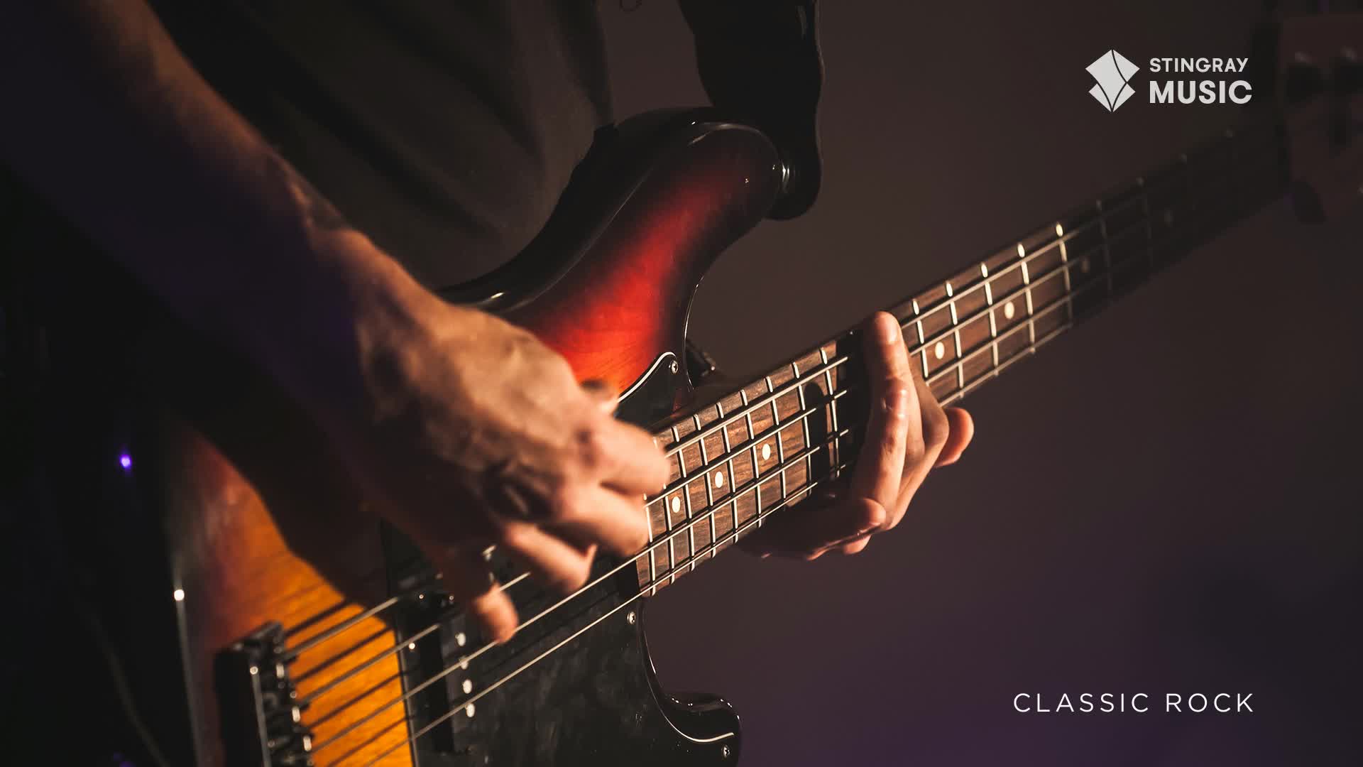 Fingers dance across the fretboard of a sunburst bass guitar, the instrument's curves reflecting the stage lights. It's a scene straight from Stingray Classic Rock, a Canadian staple.
