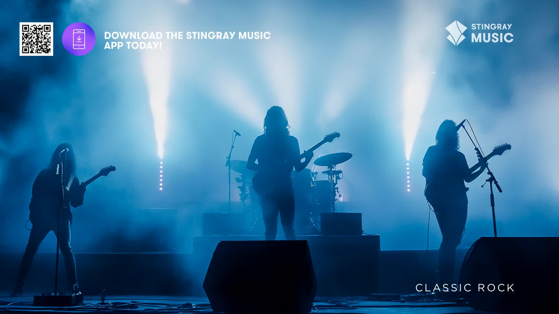 Three figures, silhouetted against a hazy blue backdrop, strum guitars under bright spotlights. The "Classic Rock" concert is brought to you by Stingray Music, a Canadian service.
