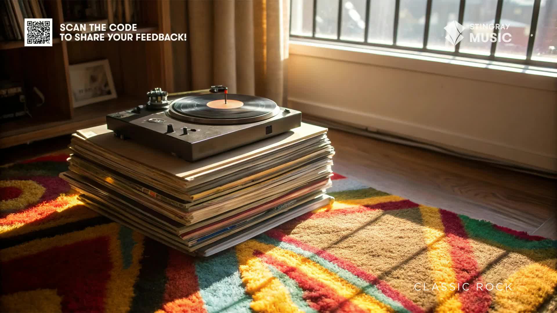 A turntable spins a record on top of a stack of albums, bathed in sunlight streaming through a window. The scene is a perfect vibe for Stingray Classic Rock, a station broadcasting from Canada.
