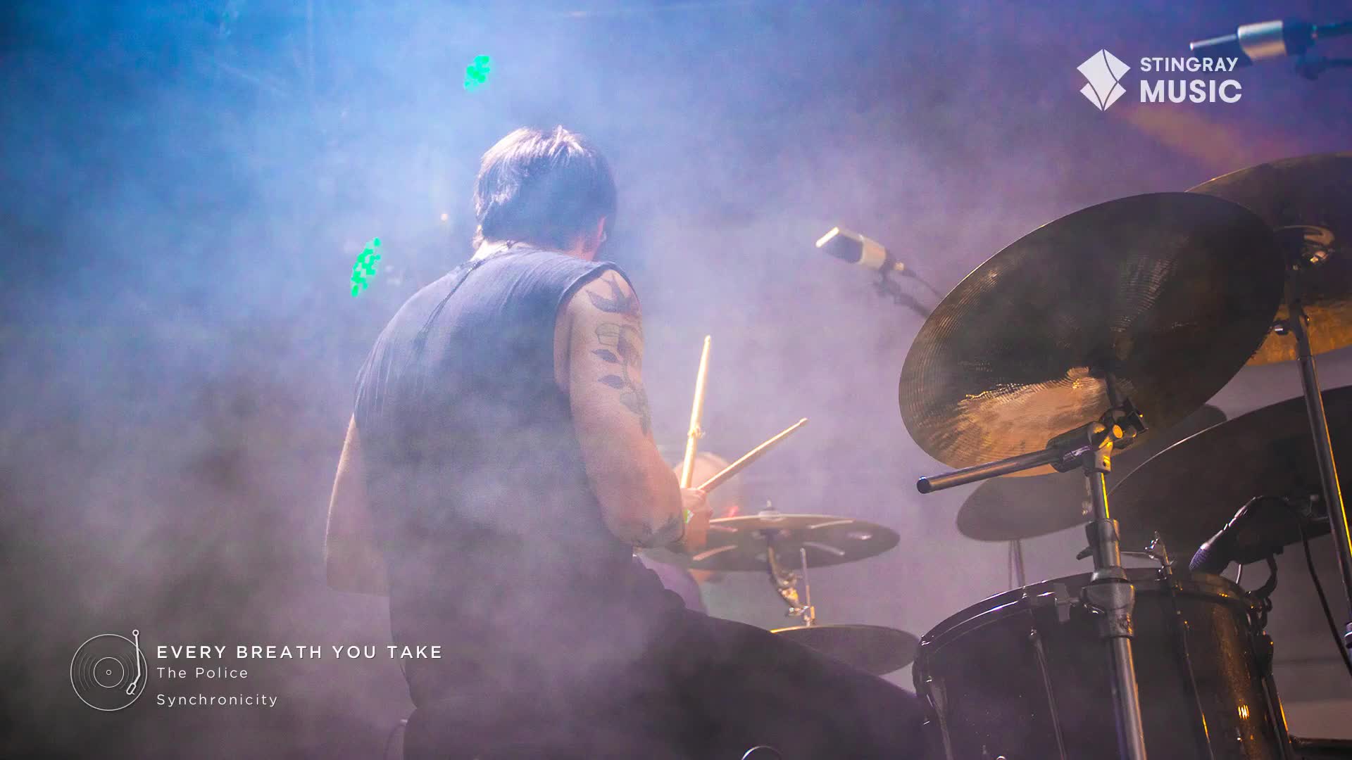 The drummer, bathed in blue light, is pounding out the beat on his cymbals, the sticks a blur in his hands. A cloud of smoke hangs in the air, adding to the atmosphere of this Stingray Classic Rock concert in Canada.
The drummer, bathed in blue light, is pounding out the beat on his cymbals, the sticks a blur in his hands. A cloud of smoke hangs in the air, adding to the atmosphere of this Stingray Classic Rock concert in Canada.
