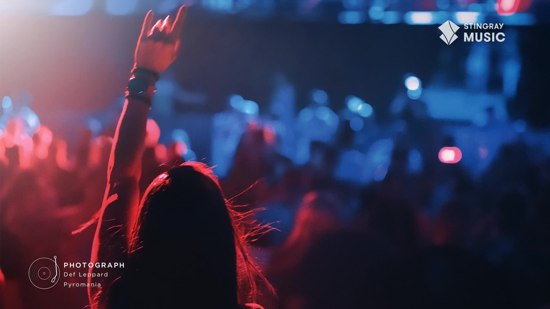 A hand, adorned with wristbands, shoots up in the air, a rock-and-roll salute against the red and blue stage lights. The crowd, bathed in the glow, is a sea of bobbing heads, all feeling the music from Stingray Classic Rock.
A hand, adorned with wristbands, shoots up in the air, a rock-and-roll salute against the red and blue stage lights. The crowd, bathed in the glow, is a sea of bobbing heads, all feeling the music from Stingray Classic Rock.