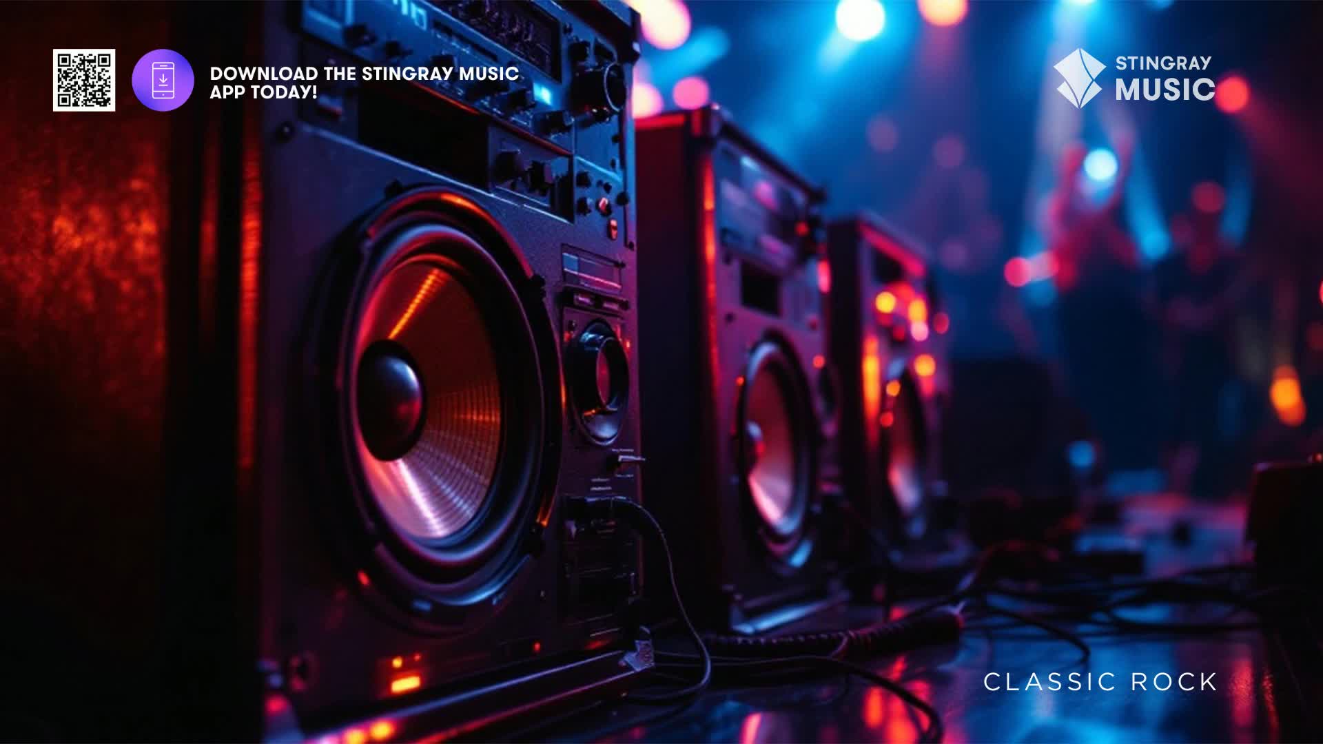 Massive speakers stand in a row, bathed in the red and blue glow of stage lights. The air hums with anticipation for classic rock music, a staple across Canada.