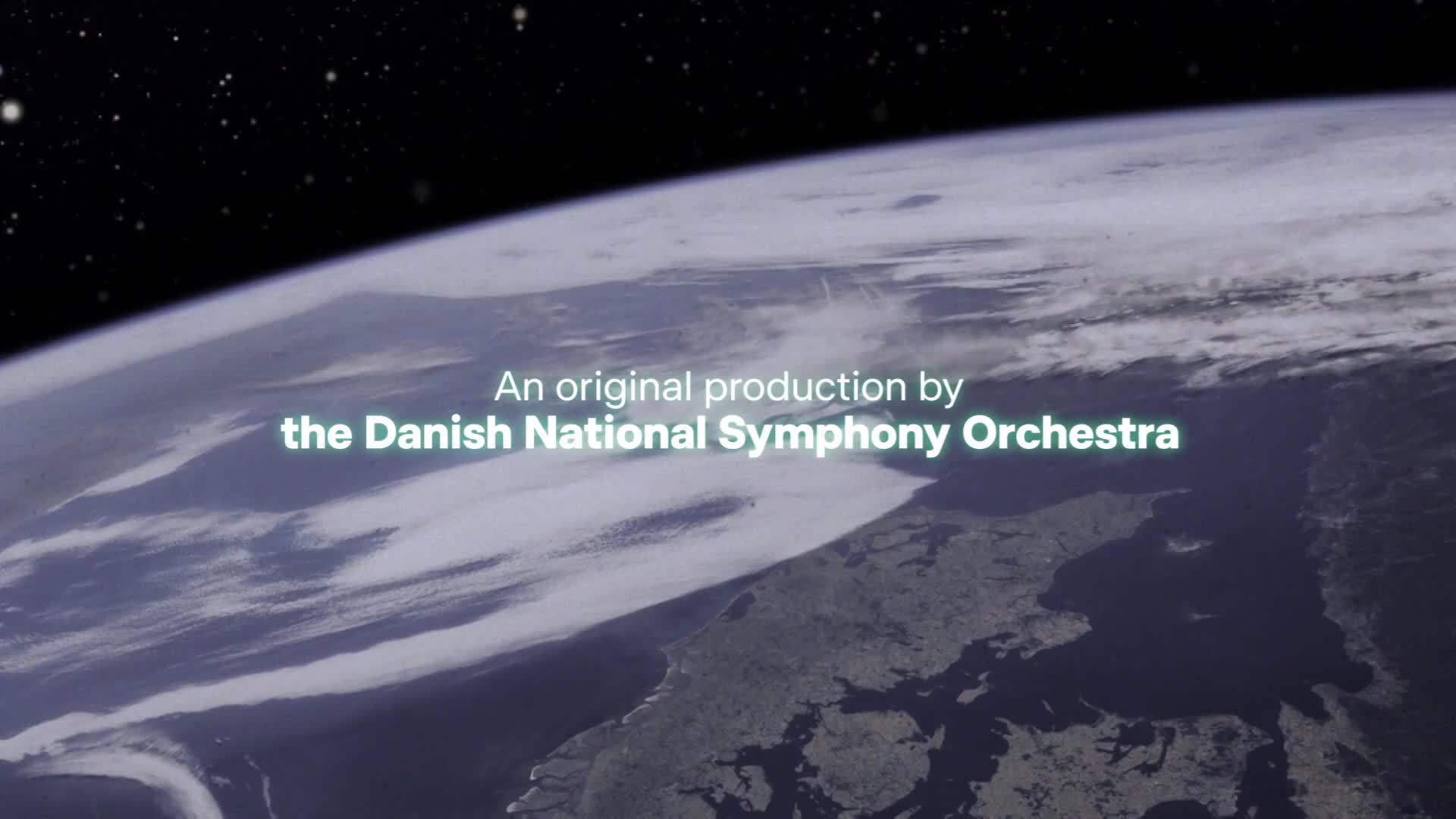 The Earth curves away from the viewer, its surface partially obscured by clouds. Text appears, announcing an original production by the Danish National Symphony Orchestra, likely on Stingray Classica.
