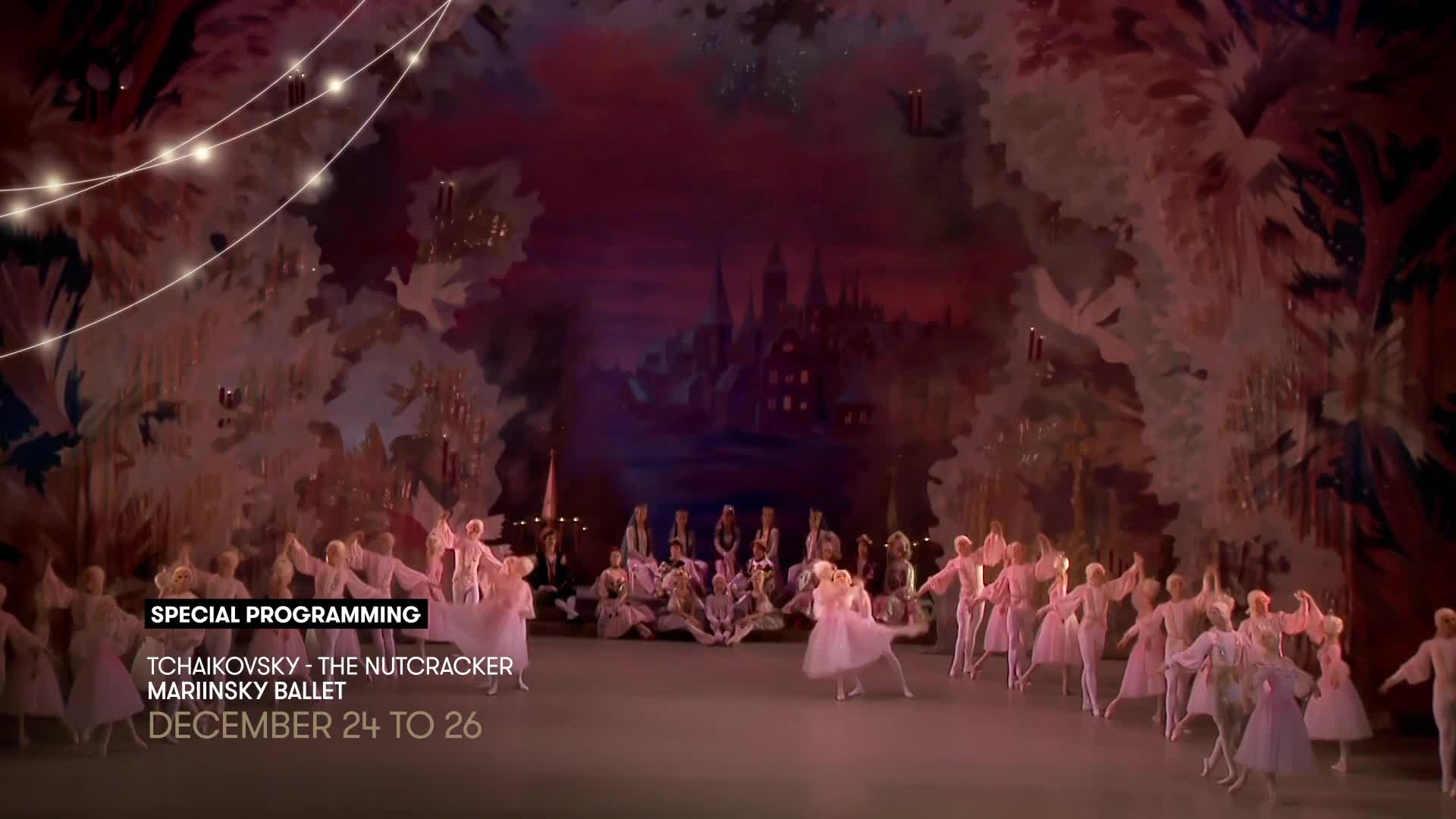Dancers in pale pink costumes glide across the stage, their movements graceful against a painted backdrop of a wintery landscape.  The Stingray Classica broadcast of the Mariinsky Ballet's Nutcracker is underway.
