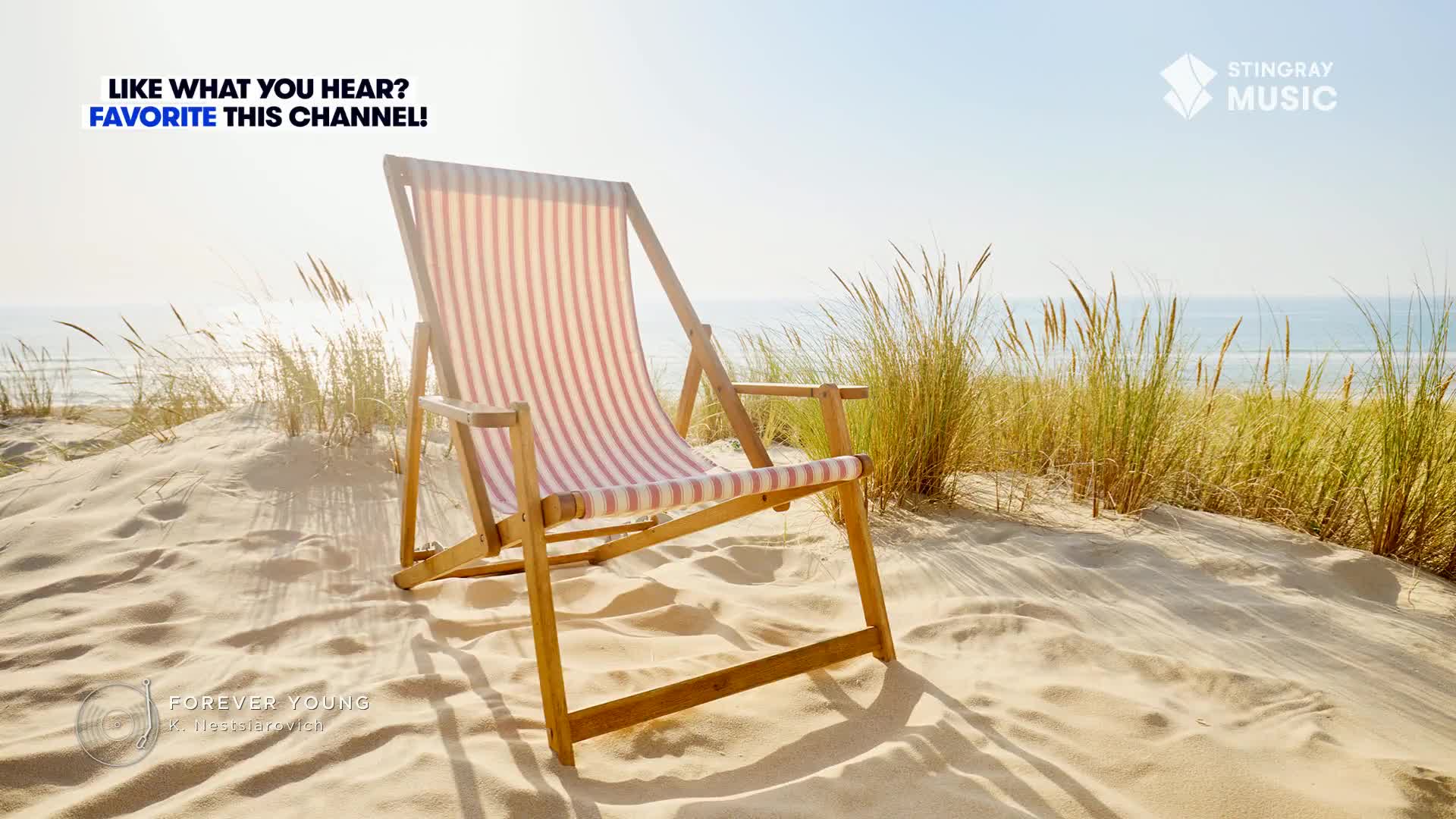 A striped beach chair sits on a sandy dune, facing the ocean. The scene feels like a commercial for Stingray Easy Listening, a perfect summer day in Canada.
