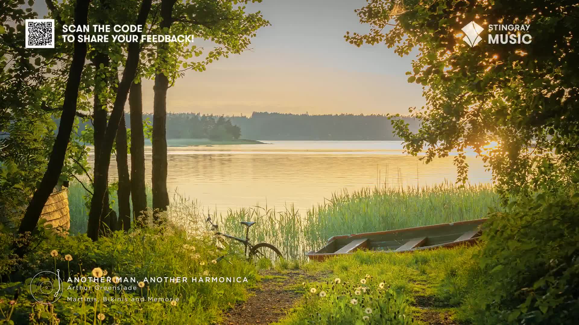 Sunlight streams through the trees, illuminating a calm lake and a small wooden boat resting on the shore. A bicycle leans near a path, and the scene feels like a perfect backdrop for the Stingray Easy Listening music playing.
