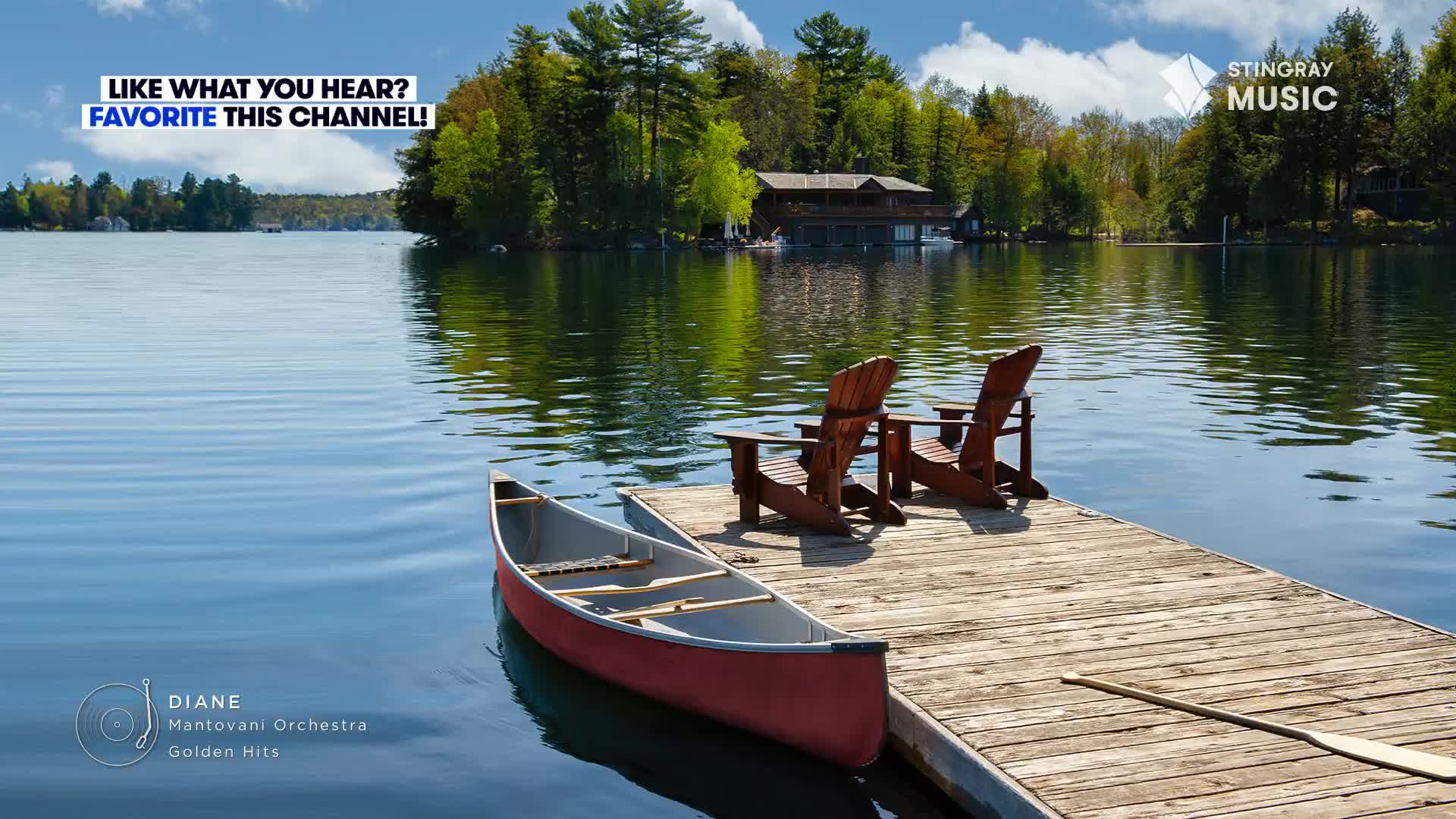 A red canoe sits docked on a wooden pier, beside two empty Adirondack chairs. The scene feels calm, with a Canadian lake and lush green trees in the background, perfect for Stingray Easy Listening.
