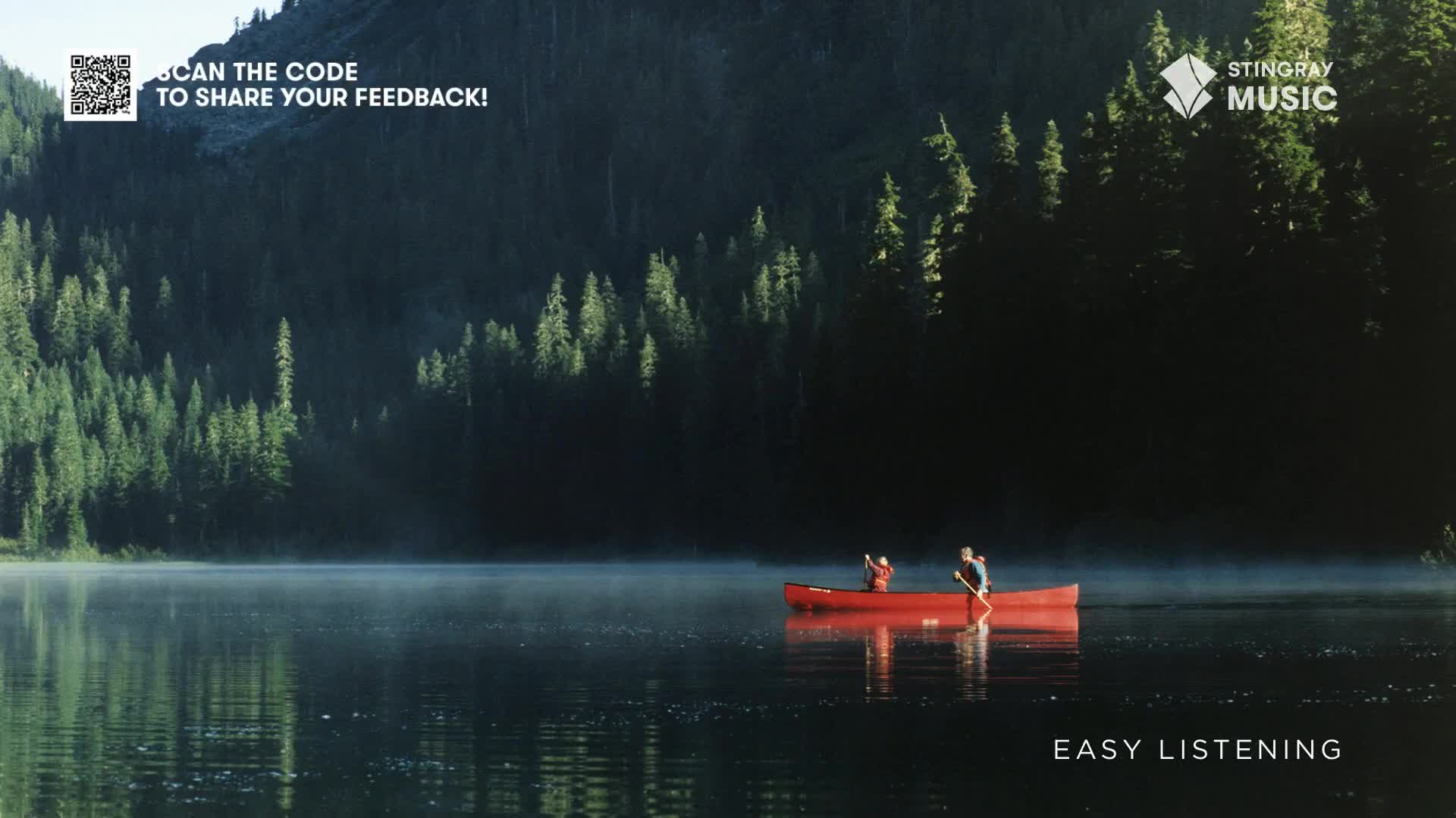A red canoe glides across a still lake, the paddles dipping rhythmically. Towering evergreens frame the scene, the air thick with the promise of a serene Canadian morning, perfect for Stingray Easy Listening.
