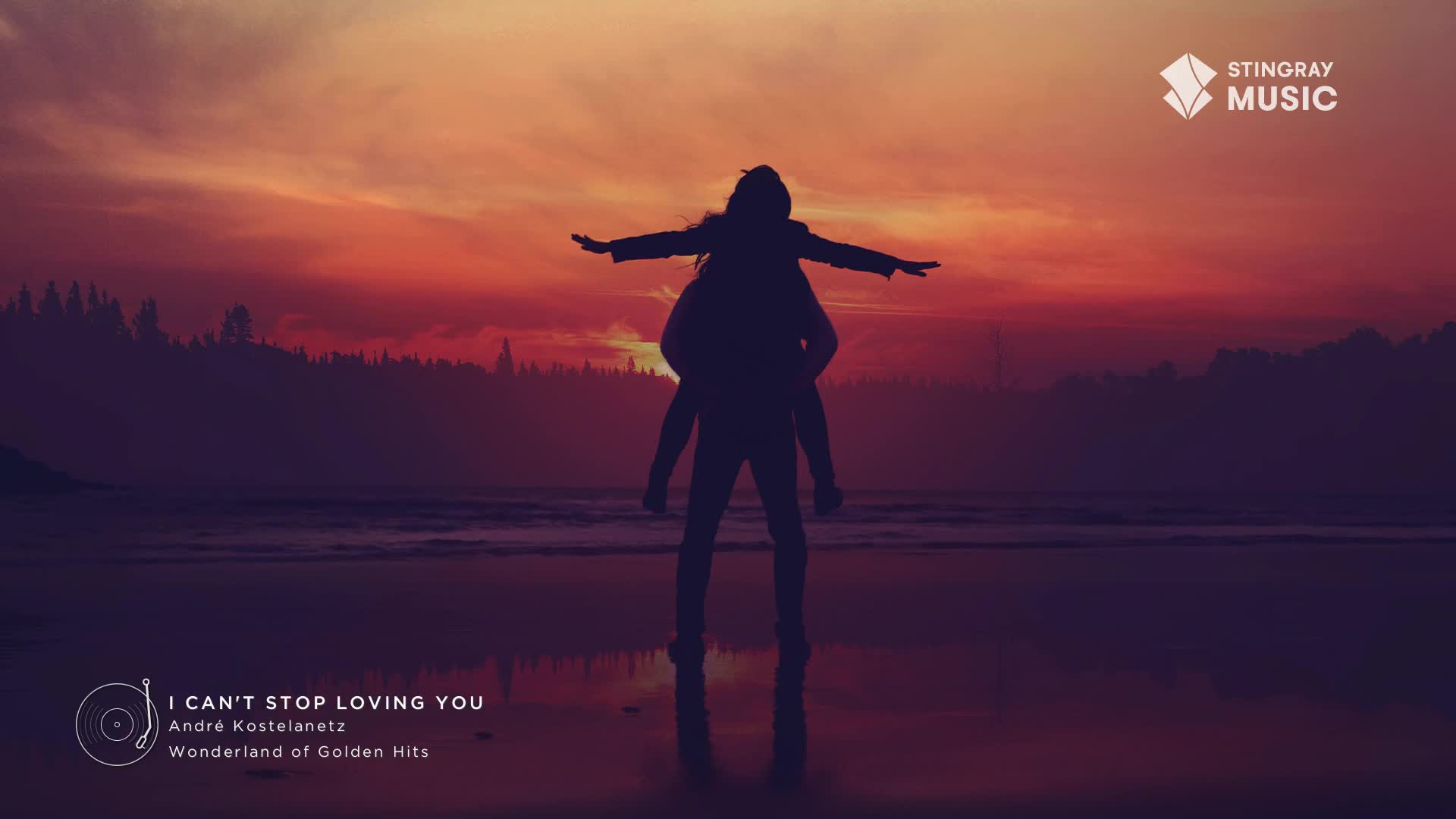 The sky bleeds orange and red over a dark, forested shoreline. A person gives another a piggyback ride on a beach, their arms outstretched like wings.