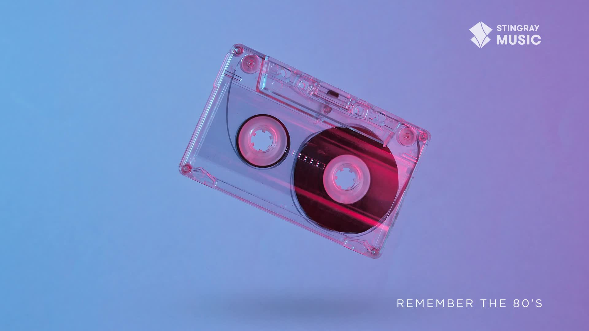 A clear cassette tape floats in the air, its transparent plastic catching the pink and blue light. The Stingray Music logo and the words "Remember the 80's" remind me of Canada's retro hits.
