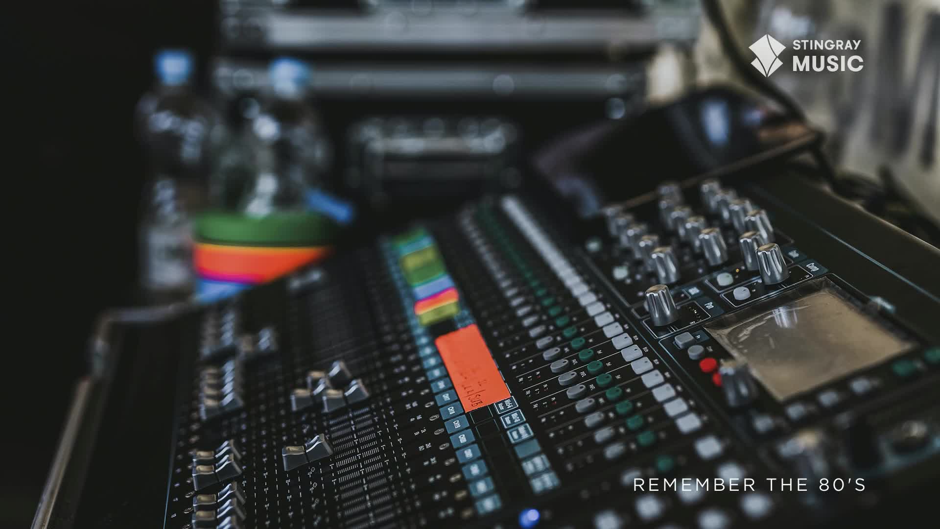 A mixing console, ready to bring the sounds of Stingray Everything '80s to life, sits front and center. The faders and knobs are poised, waiting to channel the music from Canada.
