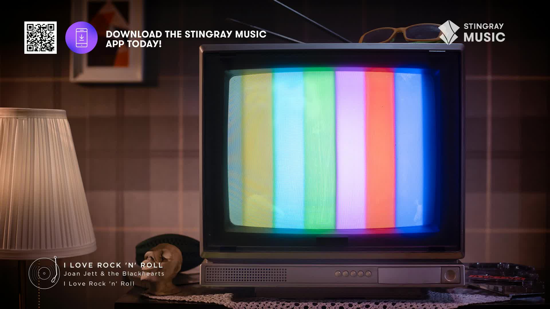 A vintage TV displays a test pattern of vertical color bars. The screen sits on a table beside a lamp, and the whole scene evokes a nostalgic, retro feel, perhaps for a Stingray Music '80s channel from Canada.
