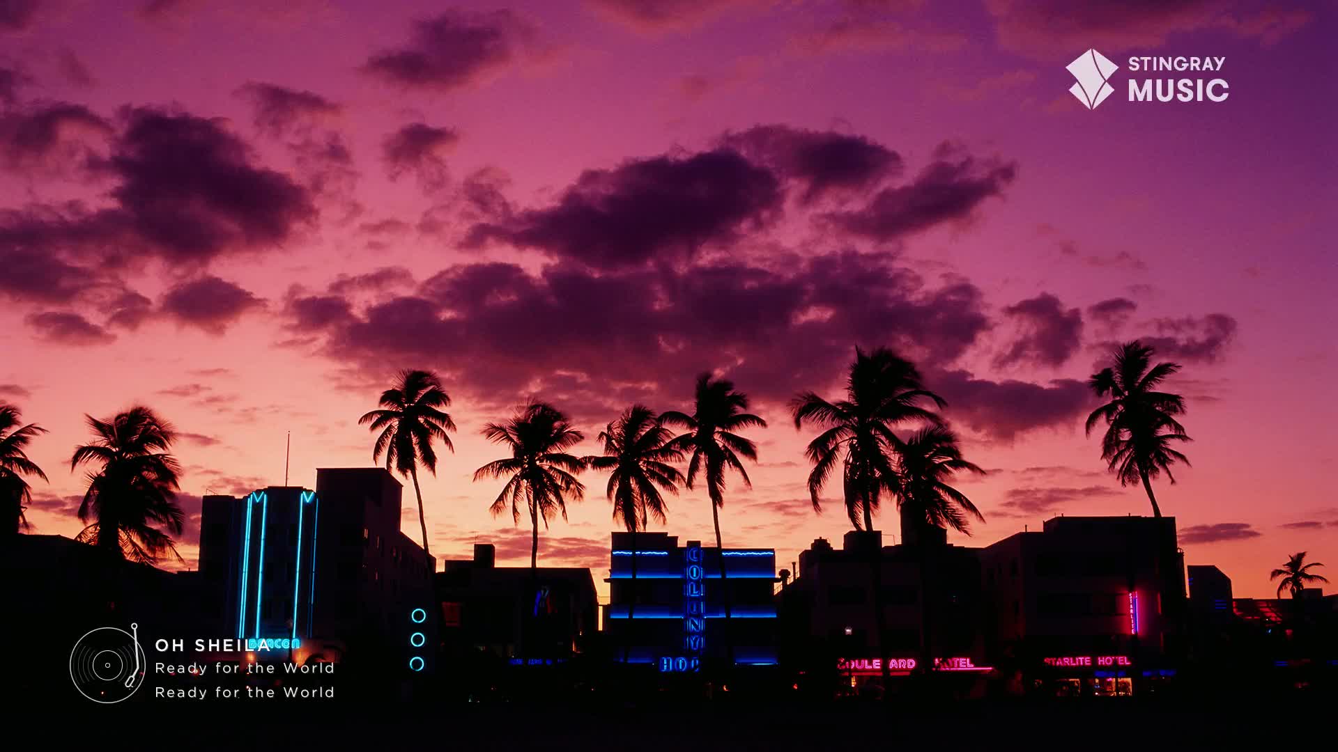 The sky bleeds pink and purple over a row of silhouetted buildings and palm trees. Neon signs glow with a vibrant blue light, hinting at a classic '80s vibe. The sky bleeds pink and purple over a row of silhouetted buildings and palm trees. Neon signs glow with a vibrant blue light, hinting at a classic '80s vibe.