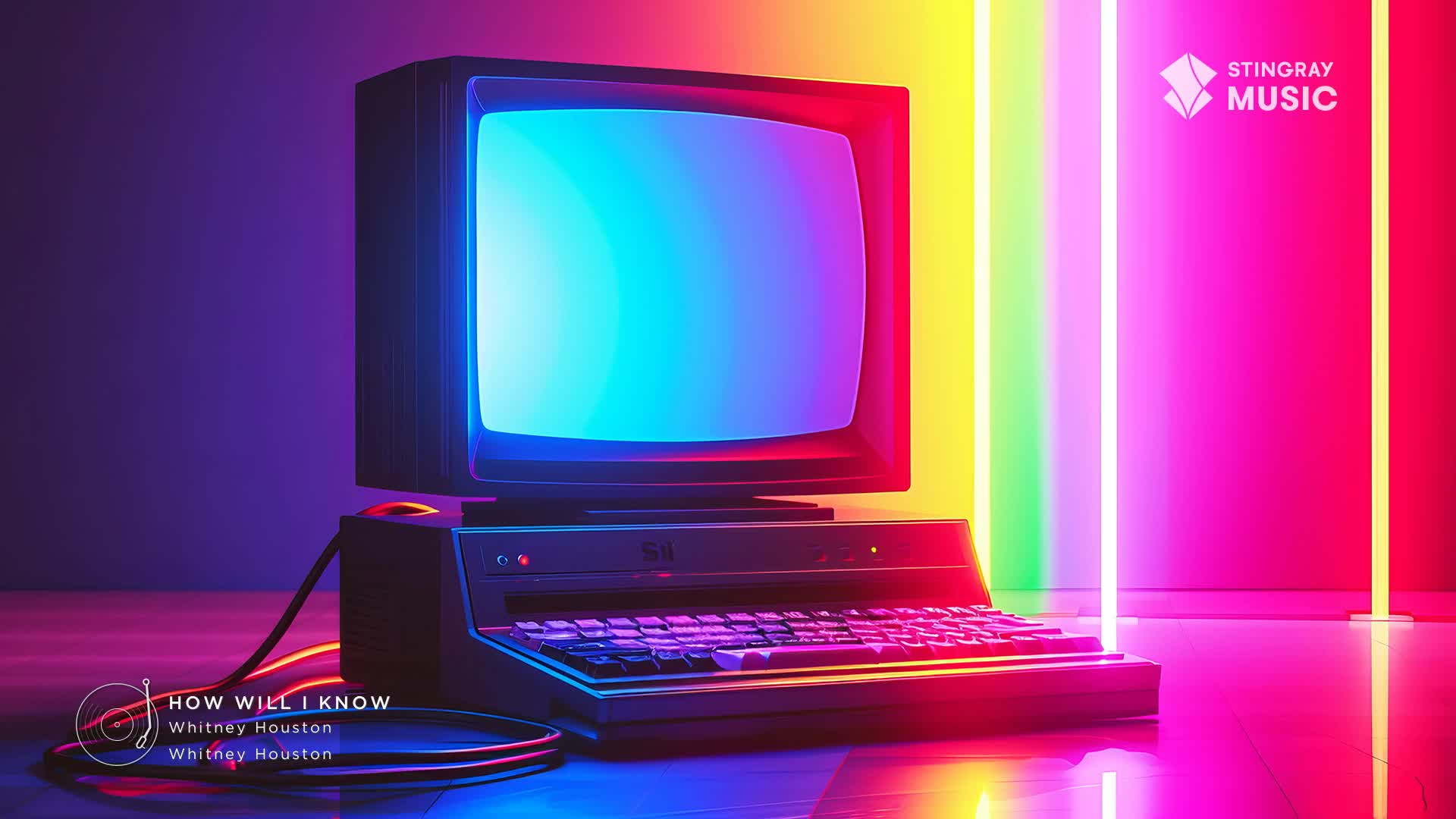 A vintage computer sits bathed in neon light, its screen displaying a vibrant blue. The whole setup pulses with the energy of a Stingray Everything '80s broadcast.