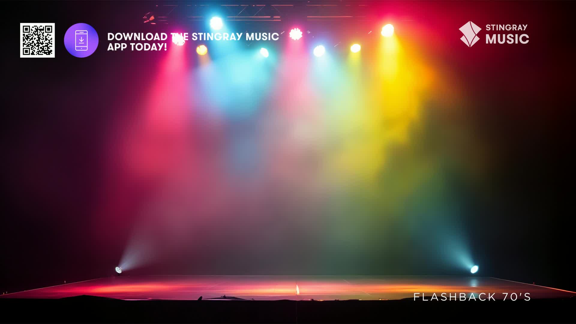 Colored spotlights cut through the haze, illuminating a stage for the Stingray Flashback 70's show. The lights paint the air with vibrant hues, and the stage floor glows.
