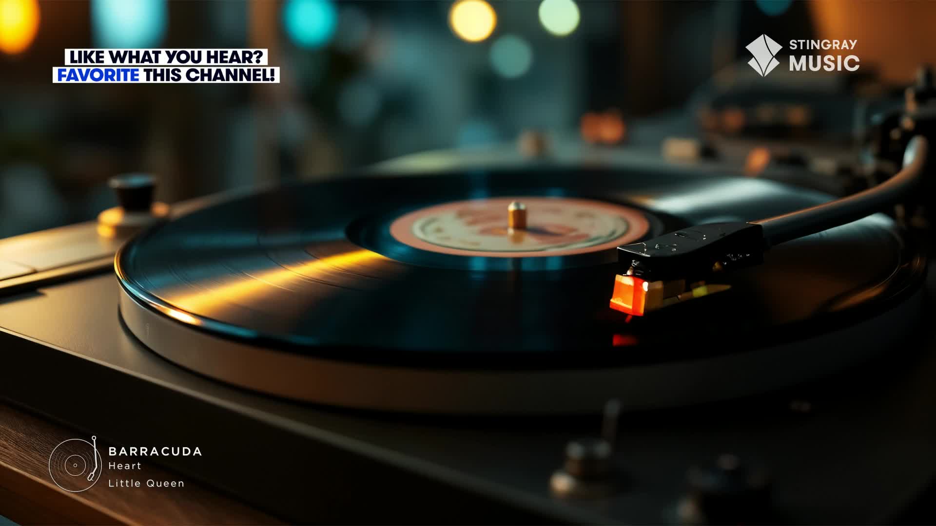A record spins on a turntable, the needle glowing orange as it tracks the grooves.  "Barracuda" by Heart is playing, a classic from the Stingray Flashback 70's in Canada.
