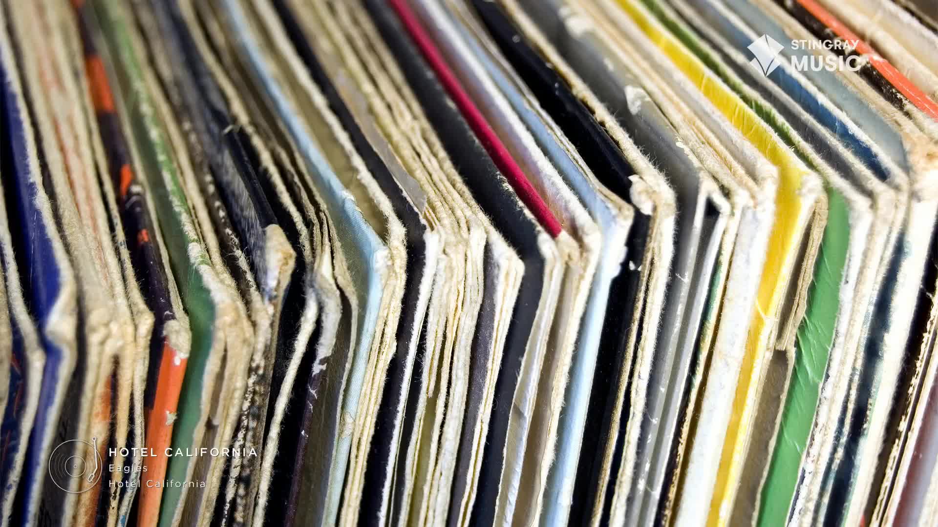 A collection of old album covers, some with faded colors, lean together. The edges are worn and show their age, like a Stingray Flashback from Canada in the 70s.
