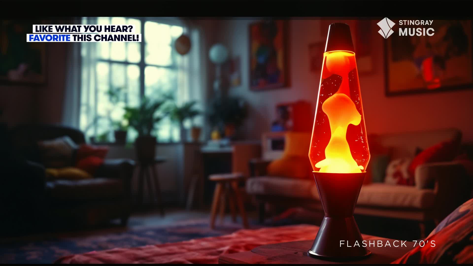 A lava lamp glows, its orange blobs slowly rising and falling. The scene feels like a cozy living room, probably somewhere in Canada, a throwback to the 70s.
