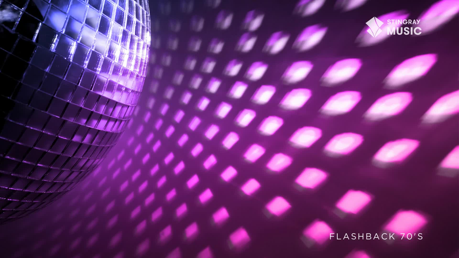 A mirrored disco ball reflects a wash of purple light onto the wall. The scene is a Stingray Flashback from the 70s, and the atmosphere is electric.
A mirrored disco ball reflects a wash of purple light onto the wall. The scene is a Stingray Flashback from the 70s, and the atmosphere is electric.