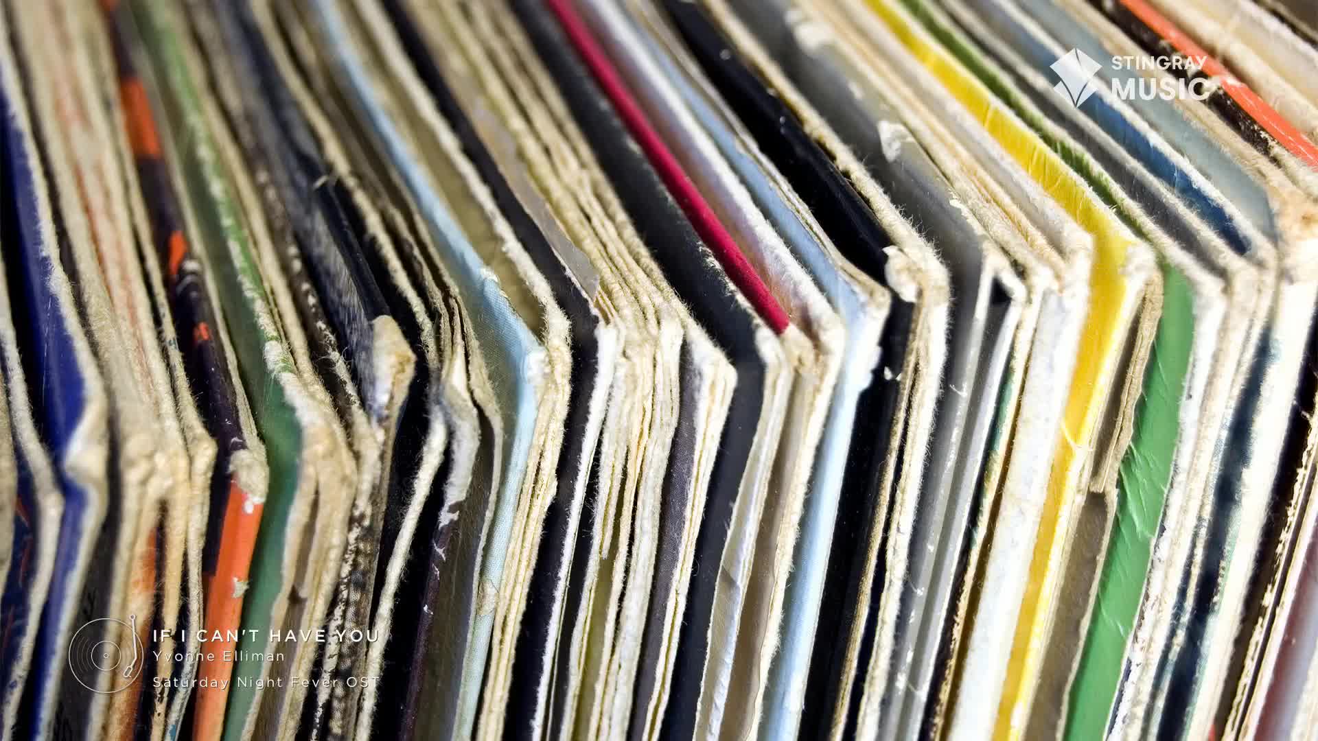 A collection of record sleeves, their edges worn and tattered, fan out in a close-up shot. The faded colors of the covers hint at the music within, a Stingray Flashback to the 70s from Canada.
A collection of record sleeves, their edges worn and tattered, fan out in a close-up shot. The faded colors of the covers hint at the music within, a Stingray Flashback to the 70s from Canada.
