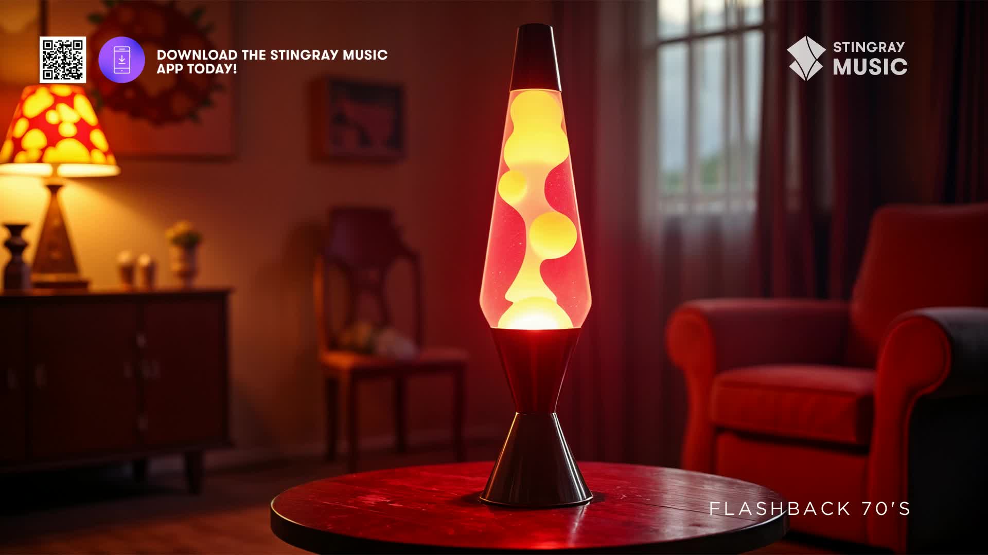 The lava lamp glows, its yellow blobs slowly rising and falling within the red liquid. A red armchair sits nearby, bathed in the lamp's warm light.