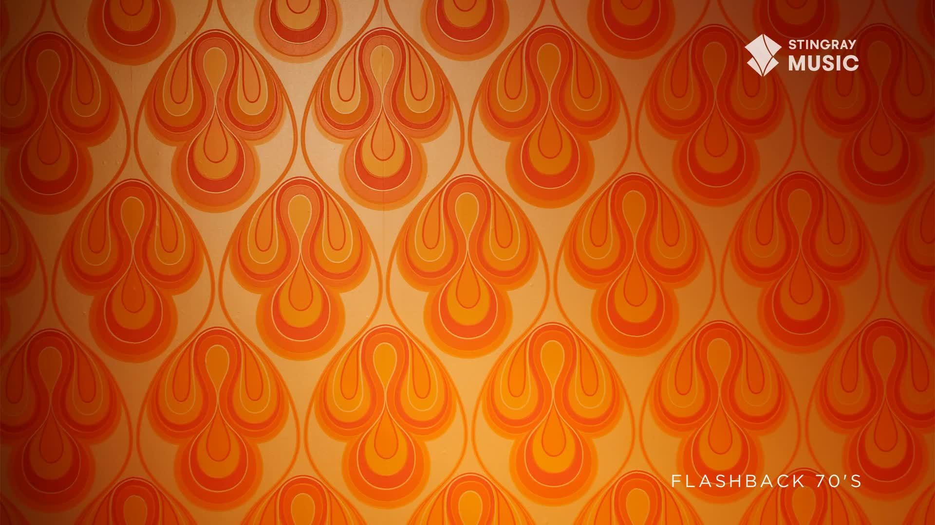 The wall is covered in a repeating pattern of orange and yellow teardrop shapes, like something from a 70s Canadian living room. A logo for Stingray Music and "Flashback 70's" are in the corner.