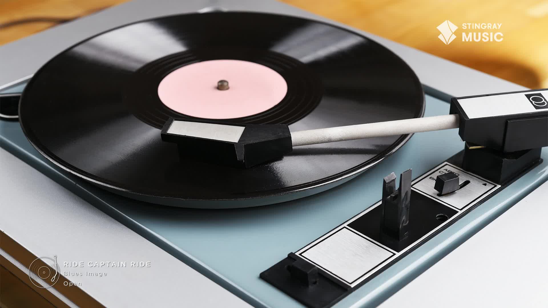 The needle rests on the spinning black vinyl, ready to play some classic 70s rock. A Stingray Music logo sits in the corner, hinting at the Canadian radio station.