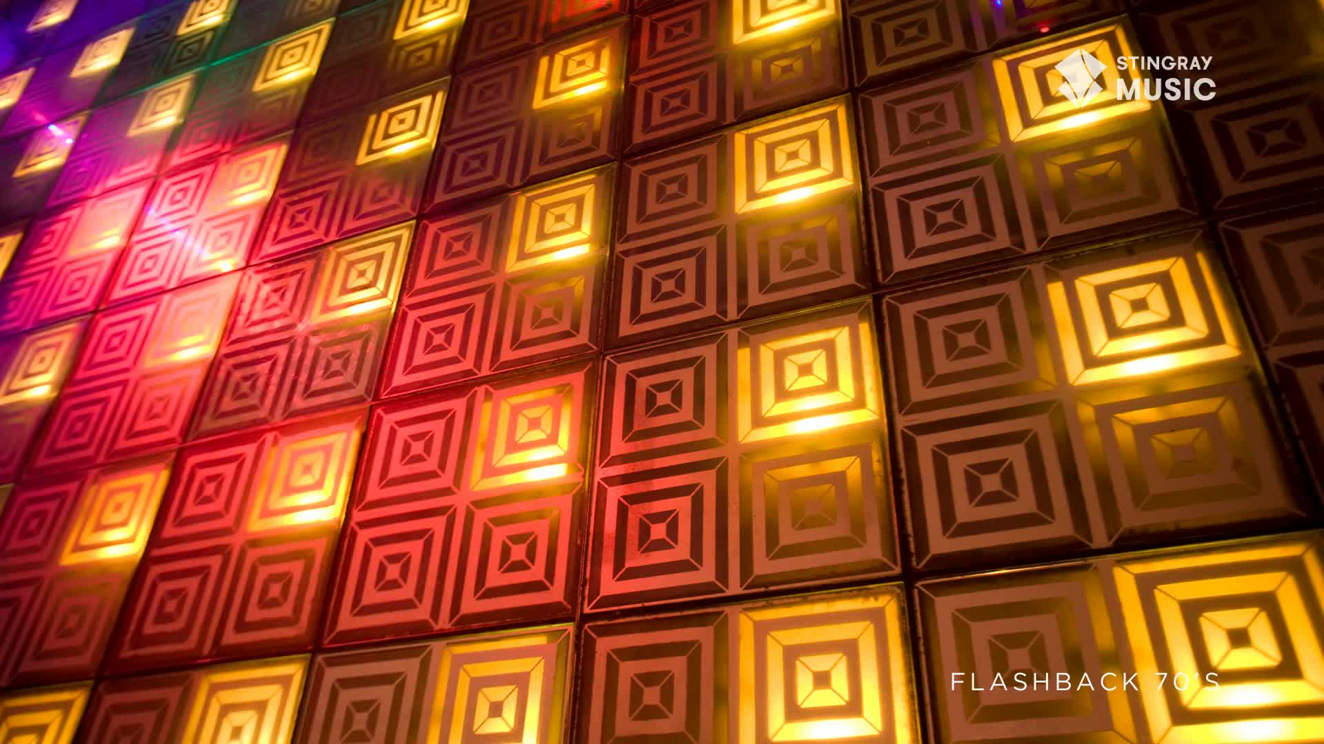 The floor lights up in pulsing waves of red and gold, a classic 70s disco vibe. It feels like a Saturday night in a Canadian club, ready for some serious dancing.