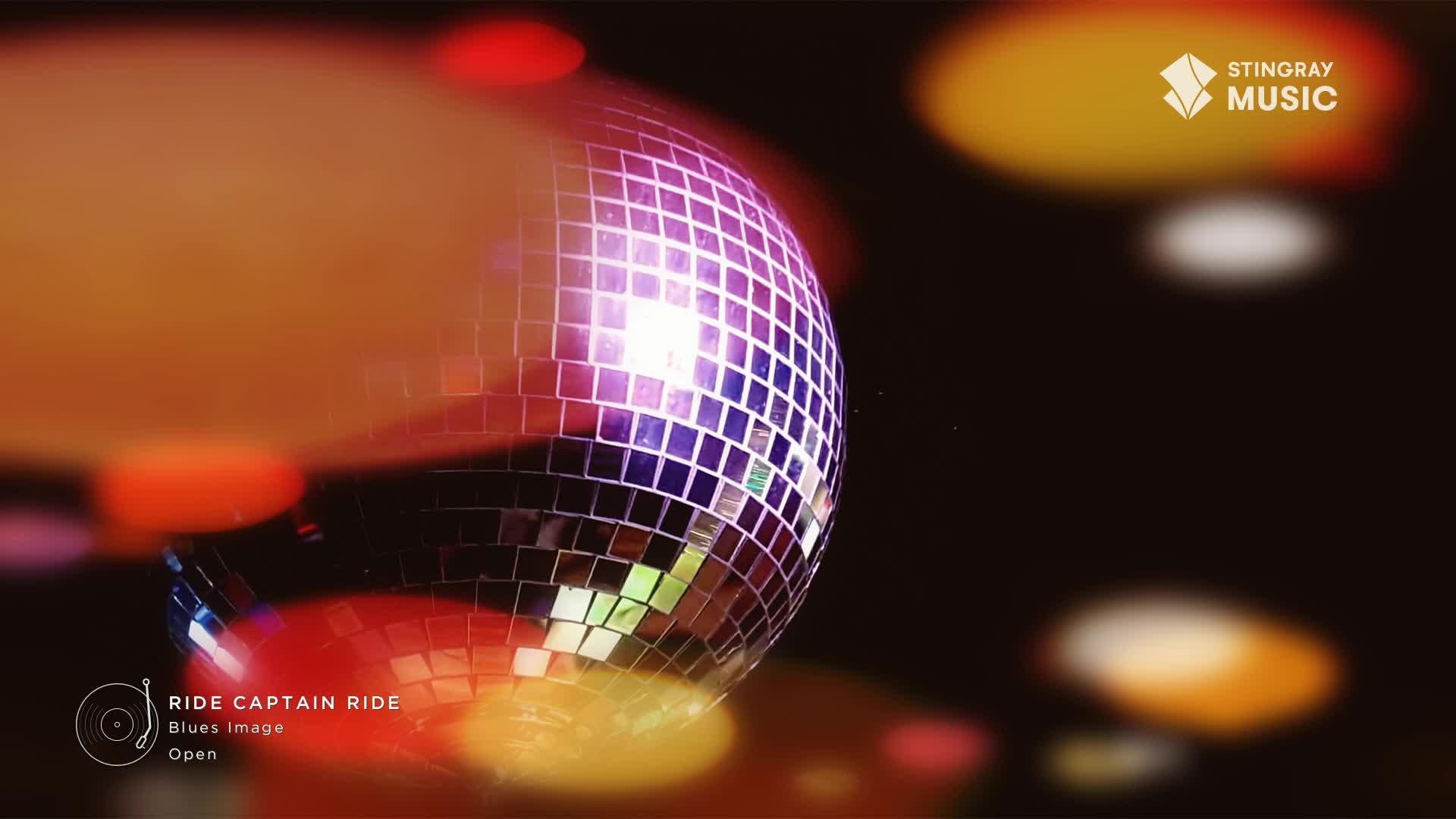 The mirrored ball spins, sending shards of light across the dim room, a true 70s flashback. A faint glow emanates from the Stingray Music logo, hinting at the soundtrack to this Canadian night.