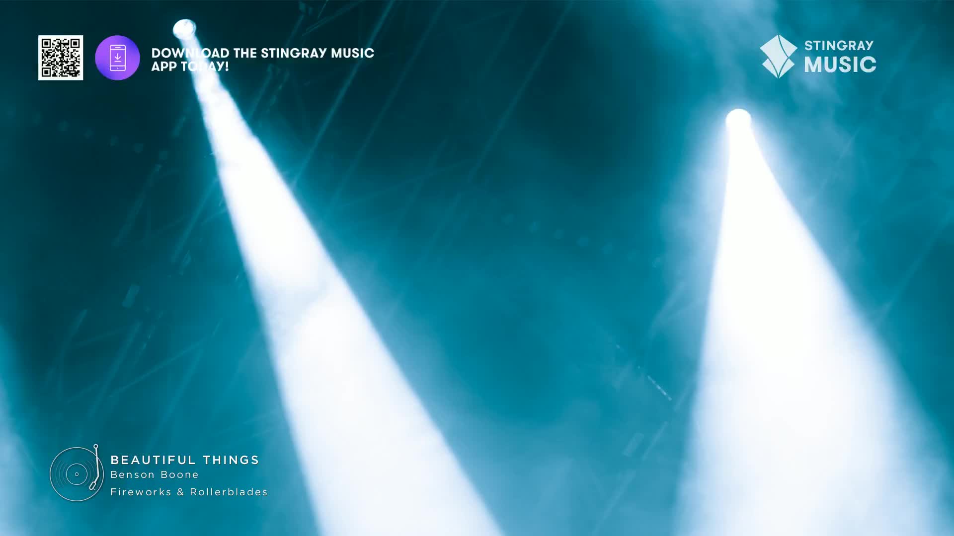 Bright spotlights cut through the hazy air, illuminating the space. The Stingray Music logo is visible, and the track "Beautiful Things" by Benson Boone is playing.
