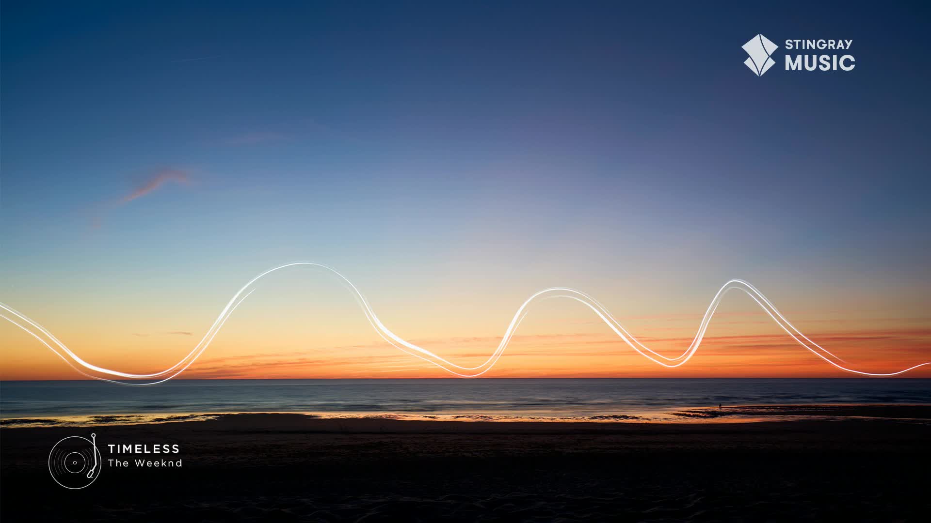 Above the ocean, a glowing white line undulates across the sky, echoing the sound of The Weeknd's "Timeless" on Stingray's Hit List. The sky is a gradient of blue and orange as the sun sets over the Canadian shoreline.
