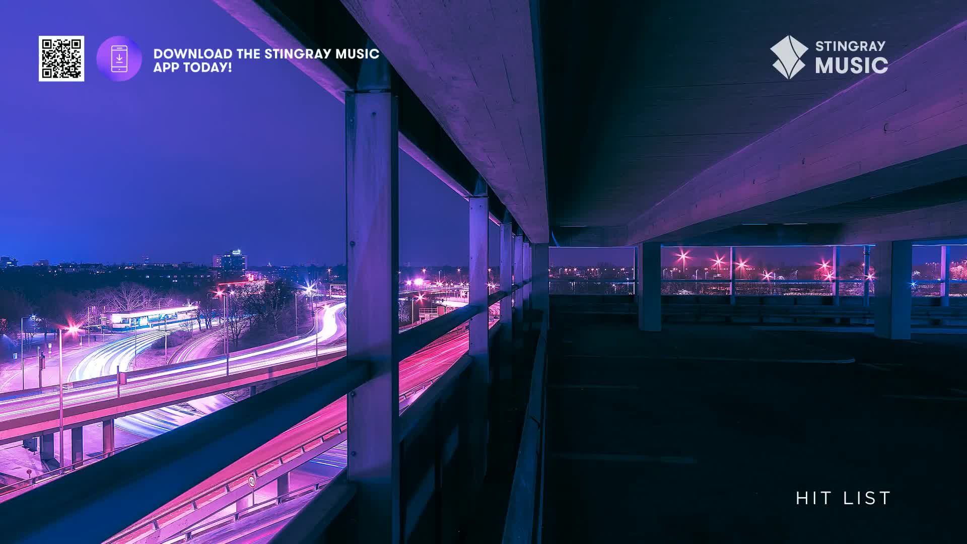 From this parking garage, the city lights glow in the distance, while streaks of headlights blur along the highway below. The Stingray Hit List is probably blasting from the speakers of those cars.
