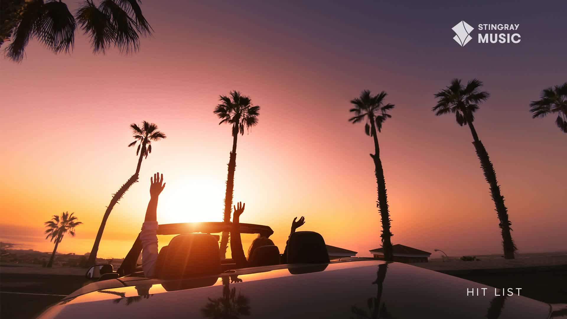 Hands wave from a convertible as the sun dips below the horizon, painting the sky in warm hues. Palm trees sway against the vibrant sunset, a perfect Canadian summer evening.