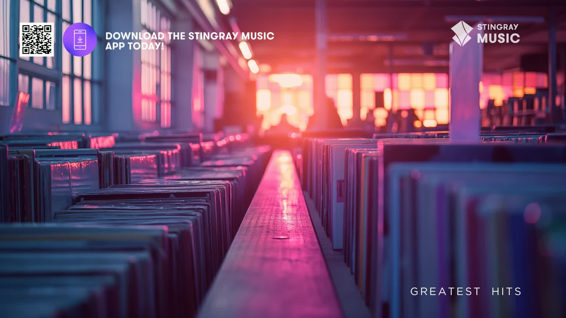 The rows of records are bathed in a warm, pinkish glow, likely from the setting sun.  "Greatest Hits" is printed at the bottom, a promise of the musical memories that await.
