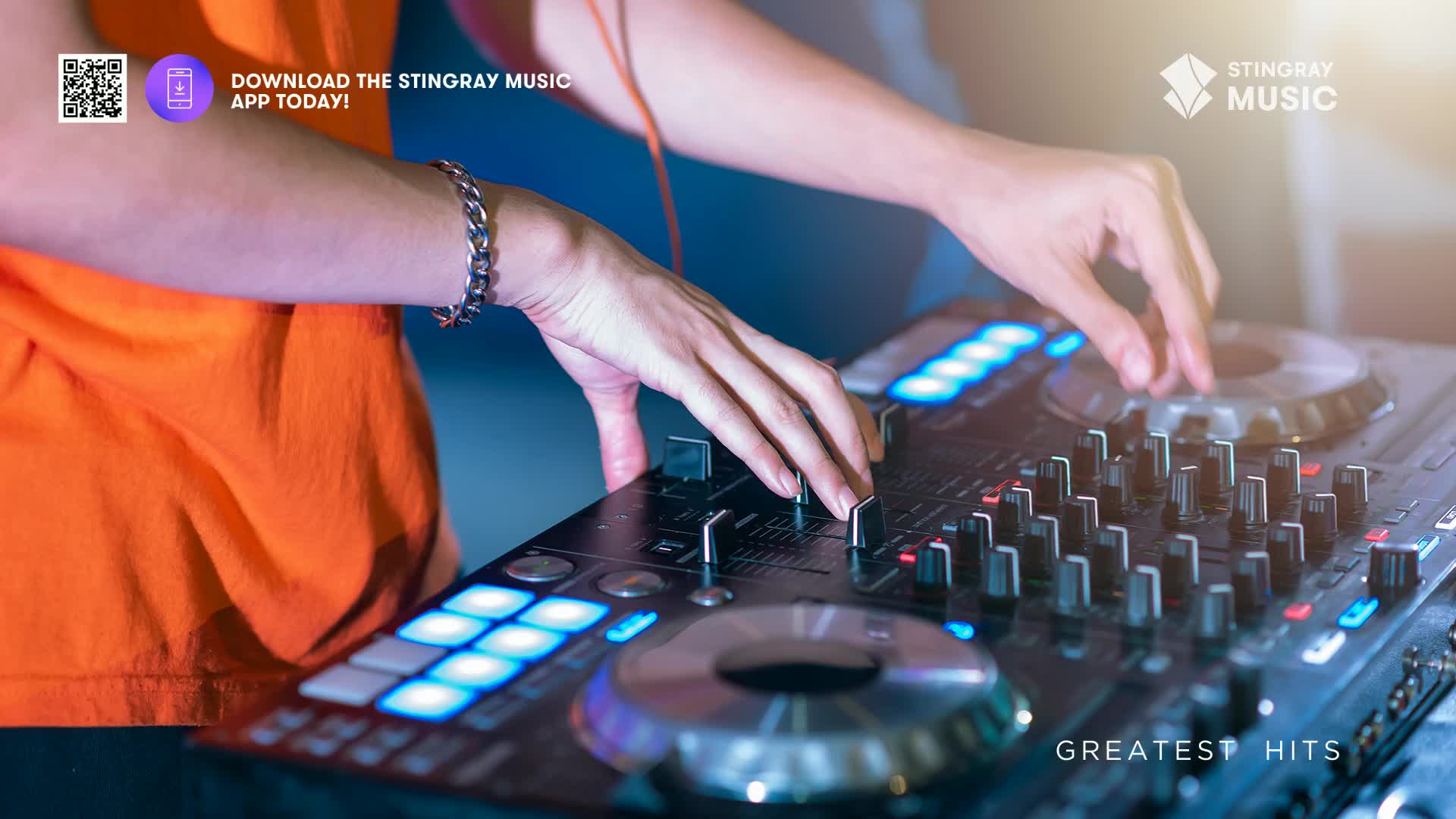 Fingers adjust the knobs on a sound mixer, bathed in blue light. The Stingray Music logo and a call to download the app are visible, promising a holiday hits soundtrack.
