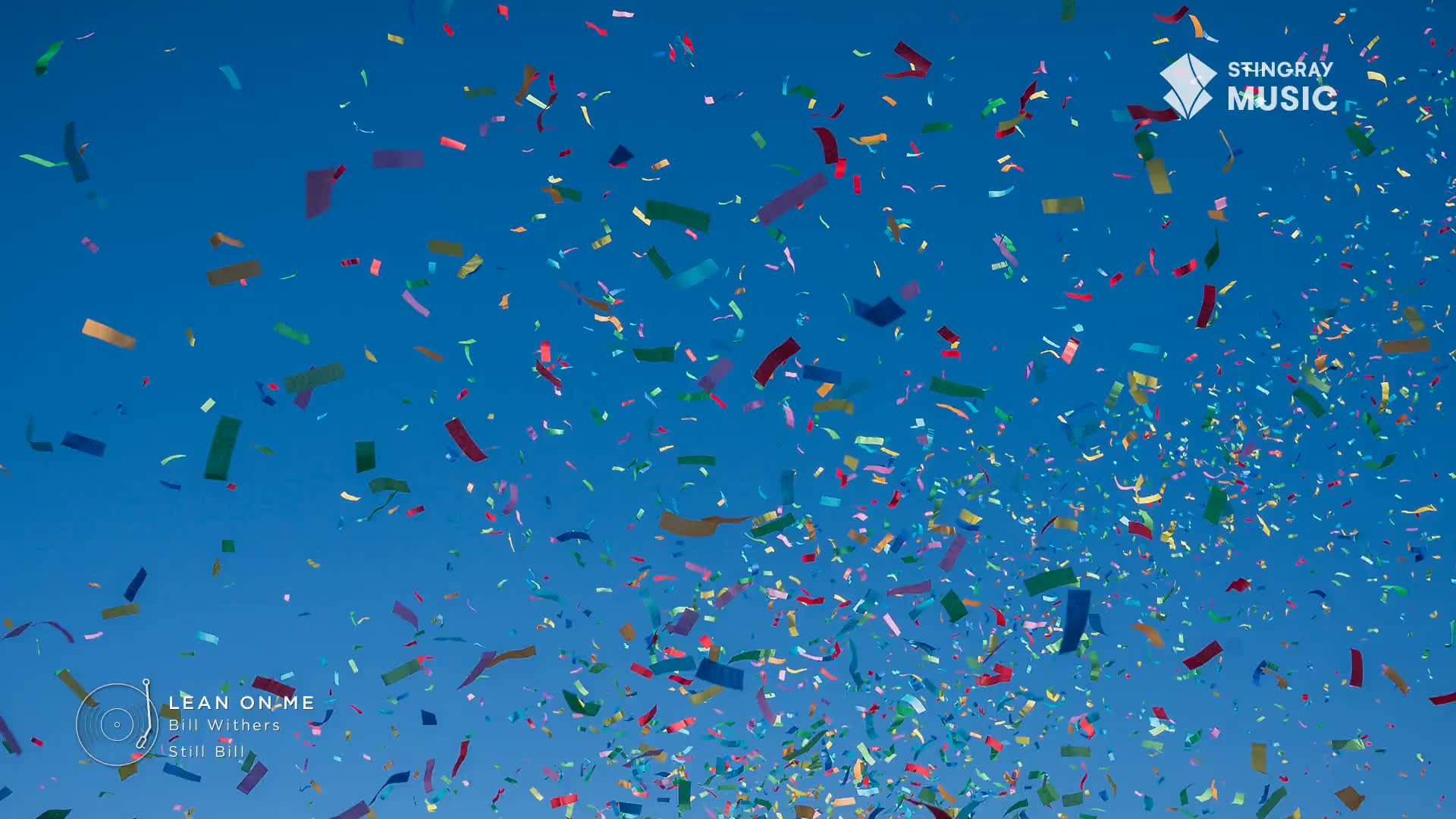 Confetti rains down against a bright blue sky, a vibrant cascade of red, gold, and green. It's a perfect Canadian summer day, and the air is filled with the celebratory spirit of Stingray Holiday Hits.