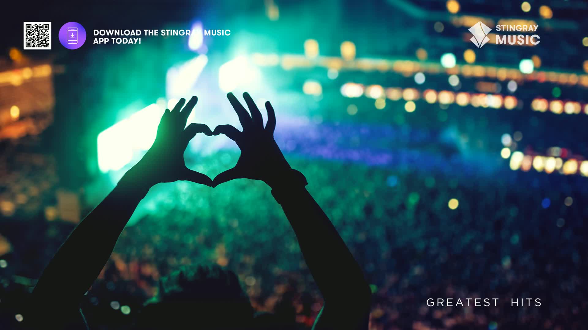 A crowd surges forward under vibrant green stage lights, their hands forming a heart shape. The air hums with anticipation for a Stingray Holiday Hits performance.