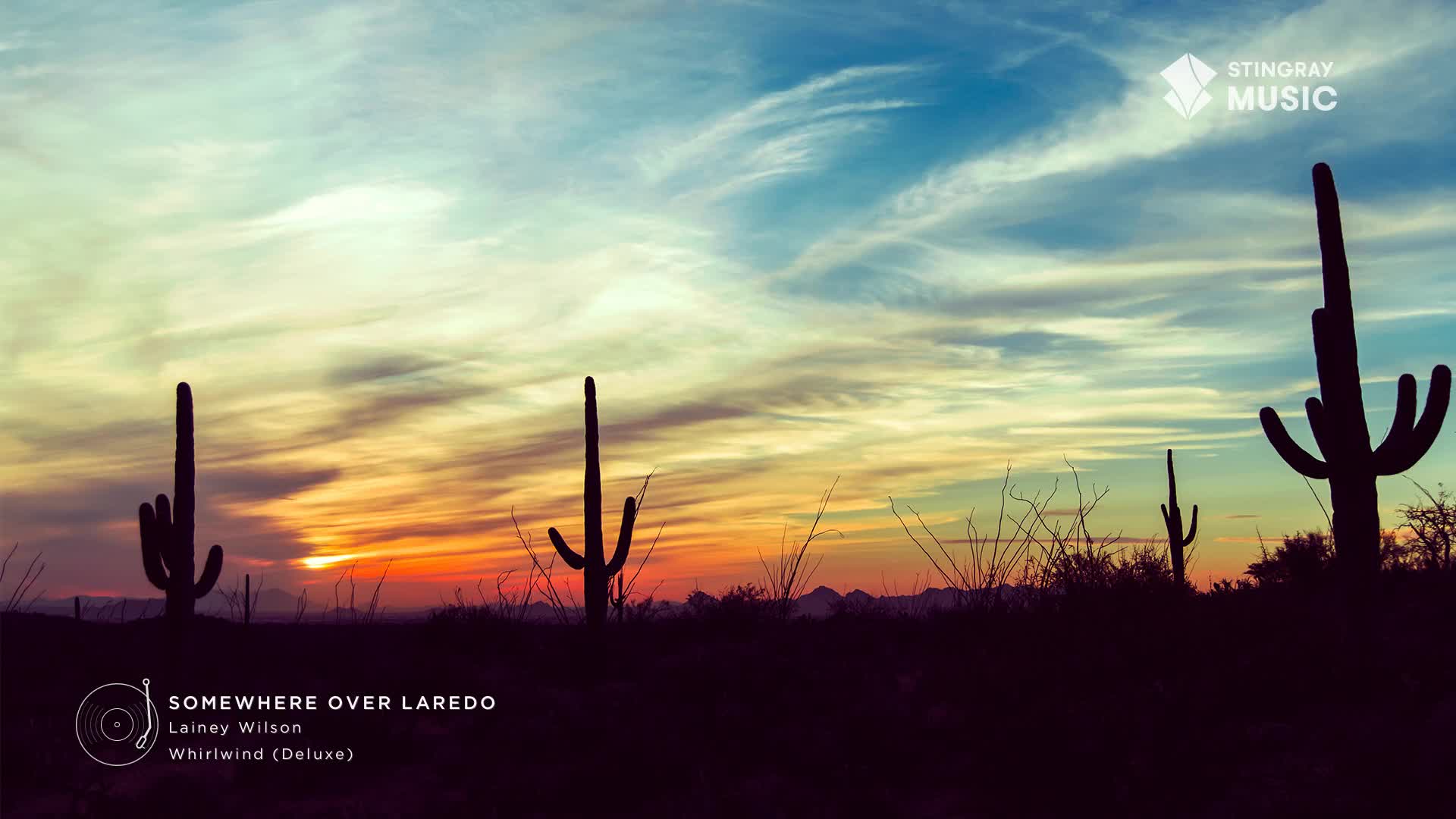 The sun dips below the horizon, painting the sky with streaks of orange and blue. Silhouetted cacti stand tall against the colorful backdrop, a scene that feels like it could be part of a Stingray Hot Country playlist.
The sun dips below the horizon, painting the sky with streaks of orange and blue. Silhouetted cacti stand tall against the colorful backdrop, a scene that feels like it could be part of a Stingray Hot Country playlist.