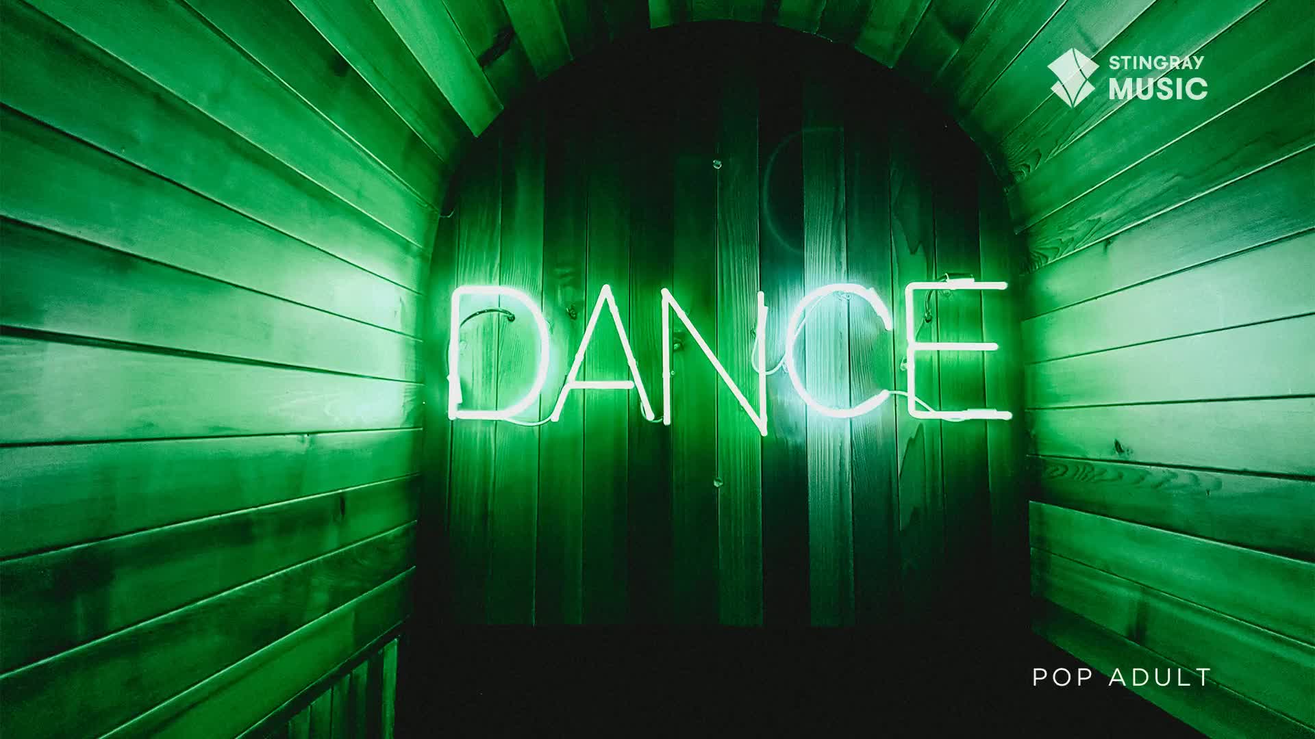 The word "DANCE" glows brightly in neon, set against a green-hued wooden backdrop. The Stingray Music logo sits in the corner, with "POP ADULT" below.
