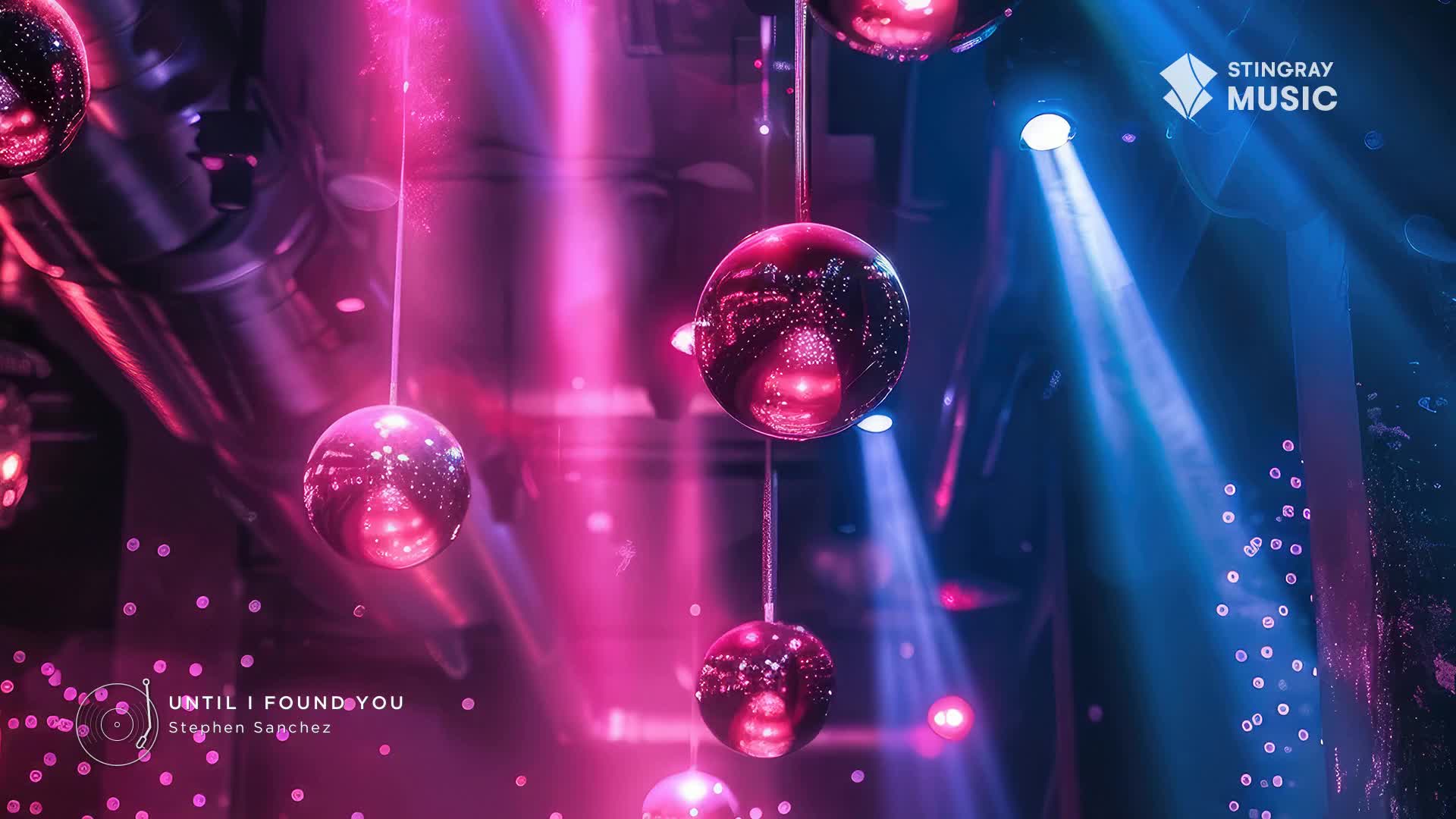 Hanging disco balls reflect the pink and blue stage lights. The Stingray Music logo is visible, and the song playing is "Until I Found You" by Stephen Sanchez.

