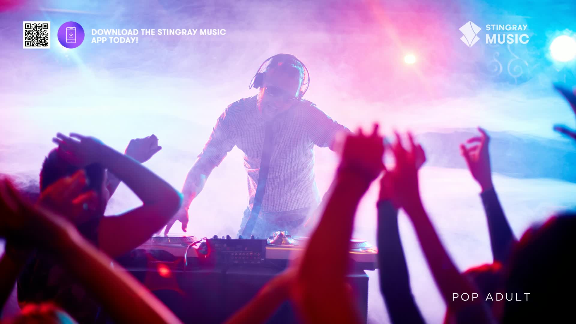 The DJ is working the turntables, lost in the music. Hands are raised all around, reaching towards the pulsing lights. The DJ is working the turntables, lost in the music. Hands are raised all around, reaching towards the pulsing lights.