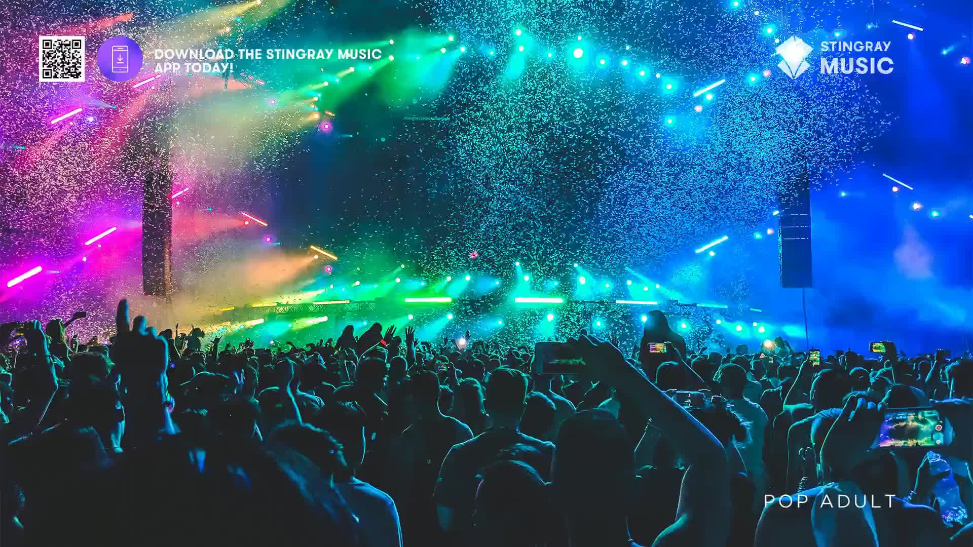 Confetti rains down on the packed crowd as vibrant stage lights paint the sky. People are holding up their phones, capturing the energy of this Canadian concert.