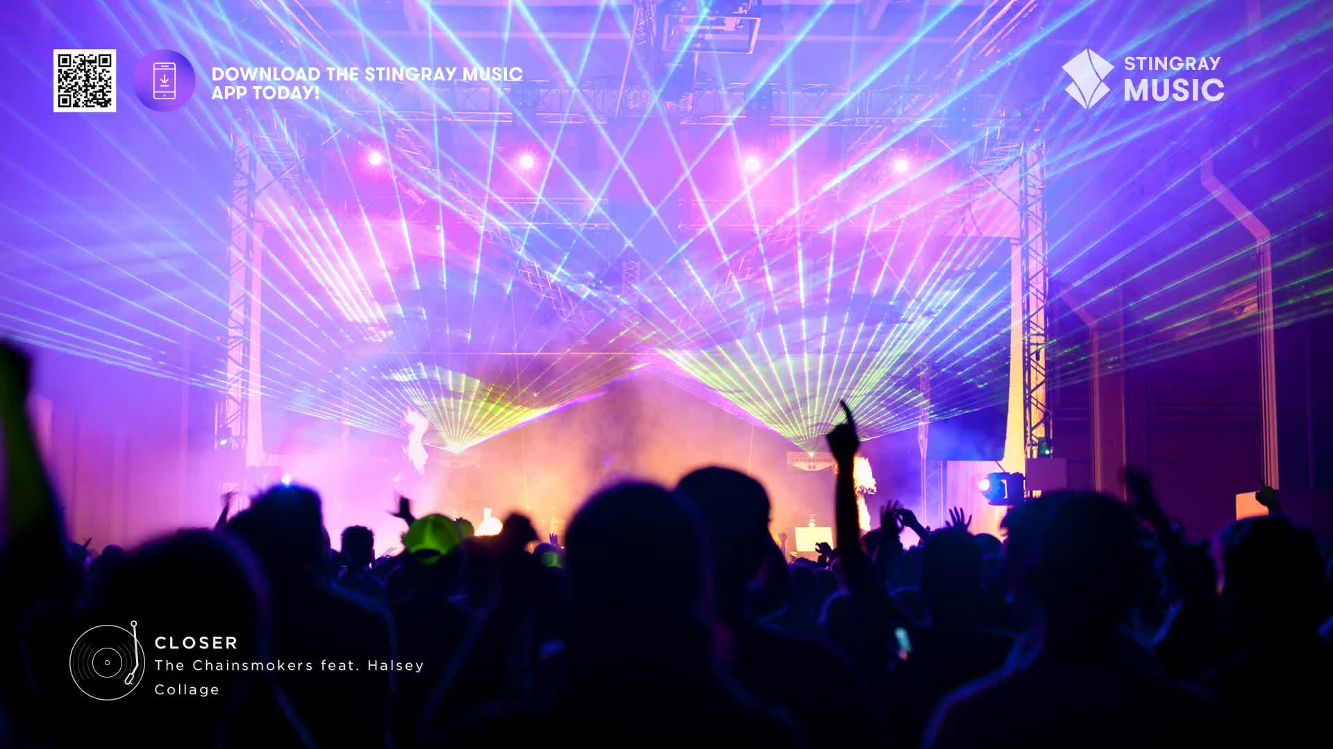 Lasers crisscross the stage, painting the air with vibrant purple and green light. A crowd surges forward, hands reaching up towards the spectacle.