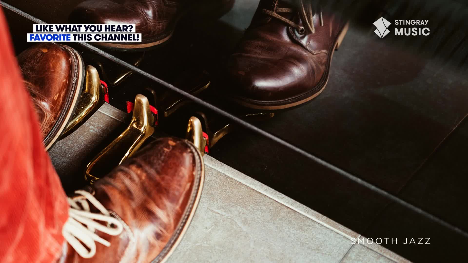 A musician's brown leather shoes are poised over the pedals of a piano, ready to play some smooth jazz. The Stingray Music logo is visible, and a call to "favorite this channel" is displayed on the screen.
