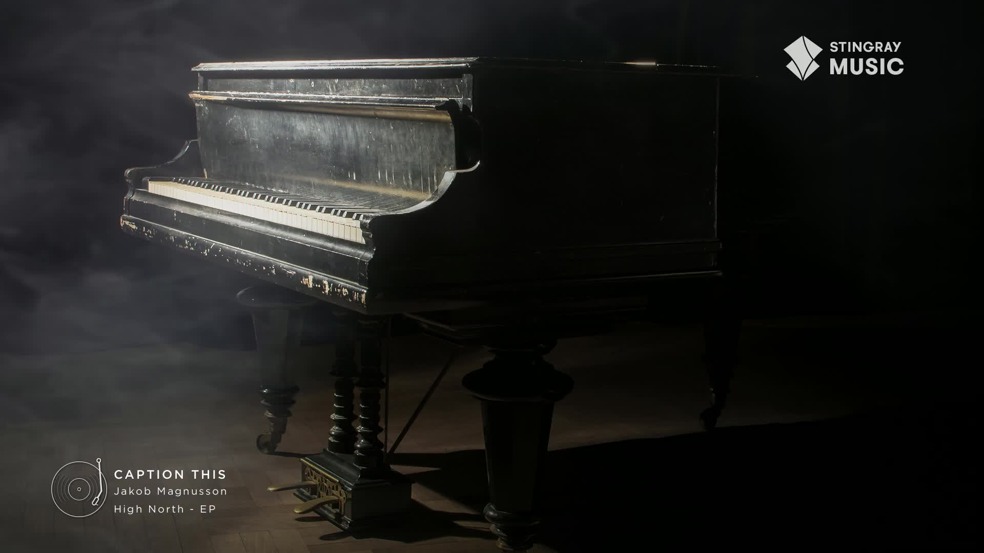 An old piano, its black paint chipped, stands in a hazy, dimly lit space. The Stingray Music logo is visible, and the album art suggests this scene is part of a smooth jazz project from Canada.
