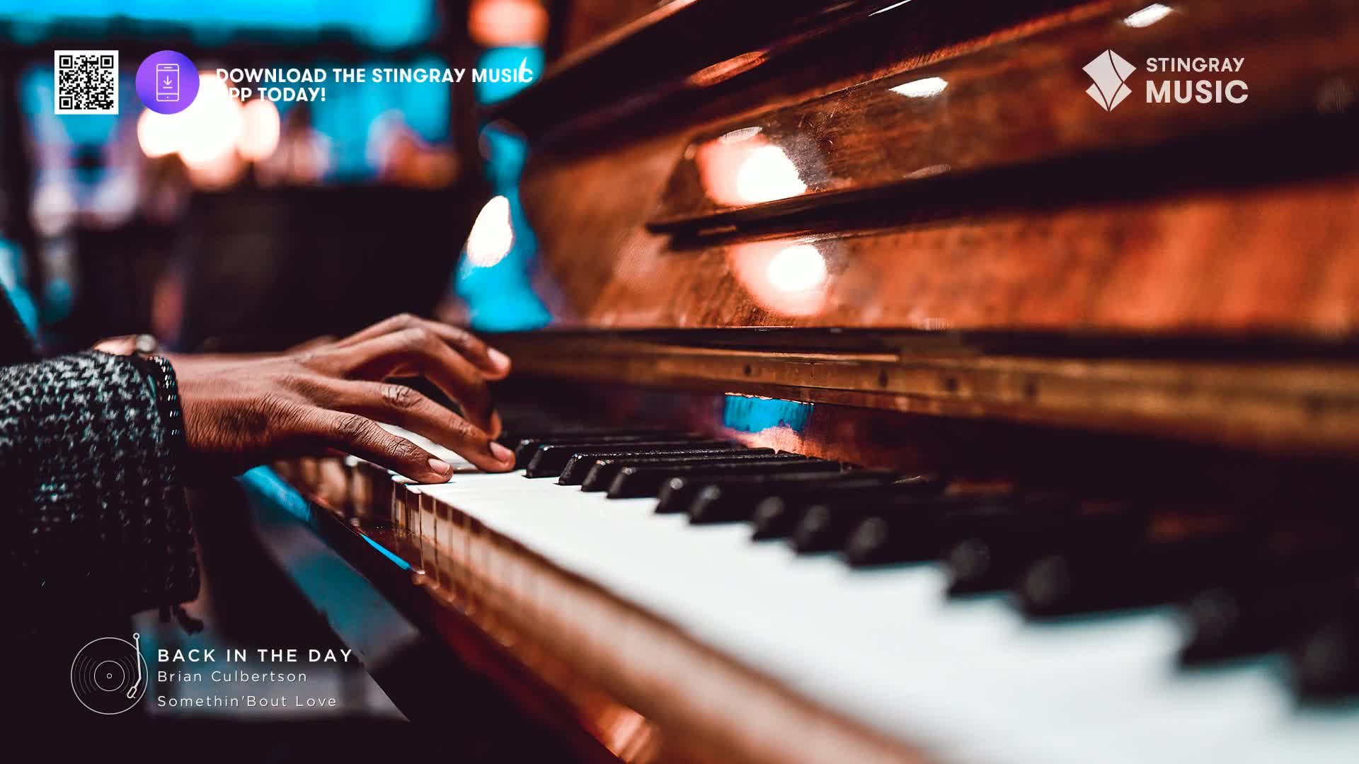 Fingers dance across the piano keys, coaxing out a smooth jazz melody. The polished wood of the grand piano gleams under the warm lights.