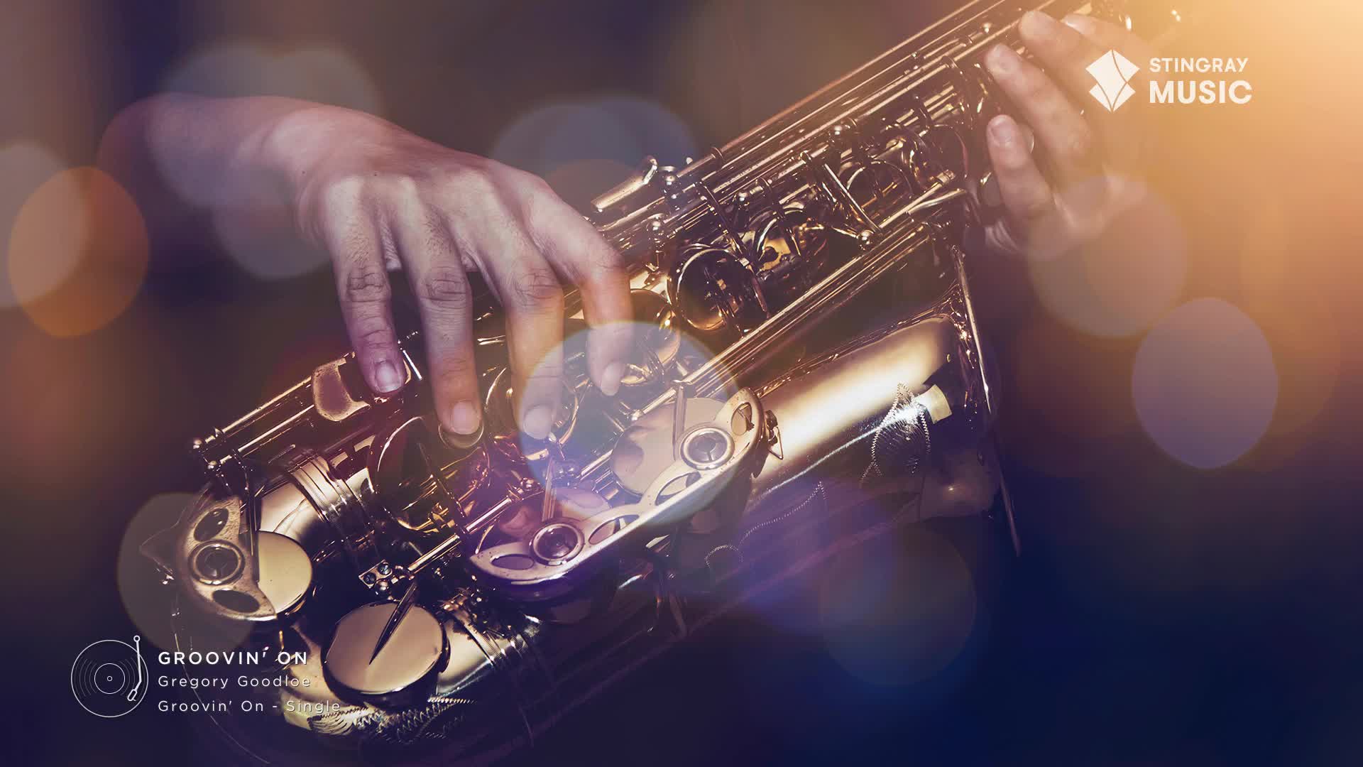 Fingers dance across the keys of a gleaming saxophone, its brass catching the light. This is Gregory Goodloe, bringing that smooth jazz vibe to Stingray Music.