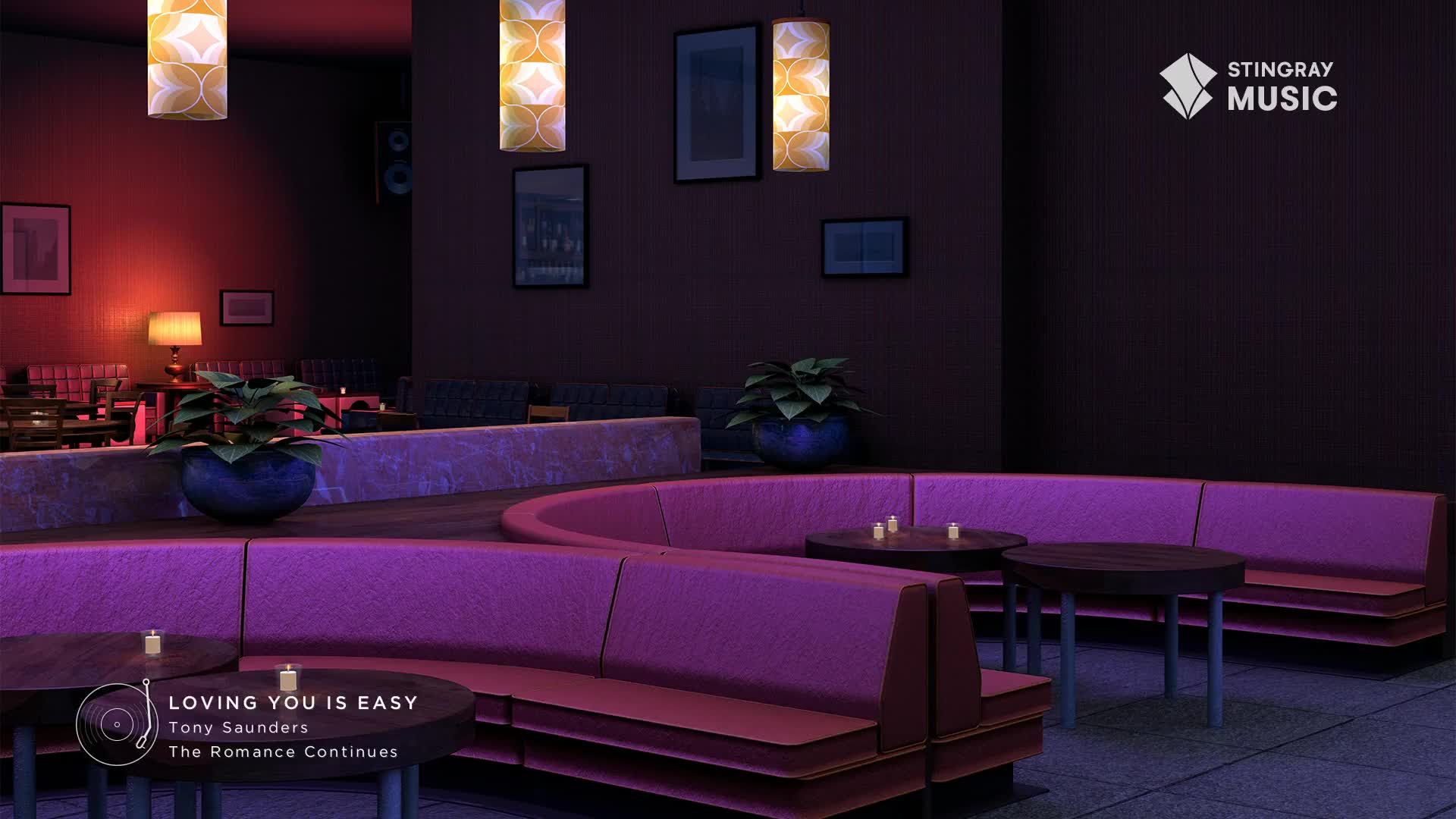 The smooth jazz from Stingray Music fills this dimly lit lounge in Canada. Plush purple banquettes curve around dark wood tables, each set with small candles.