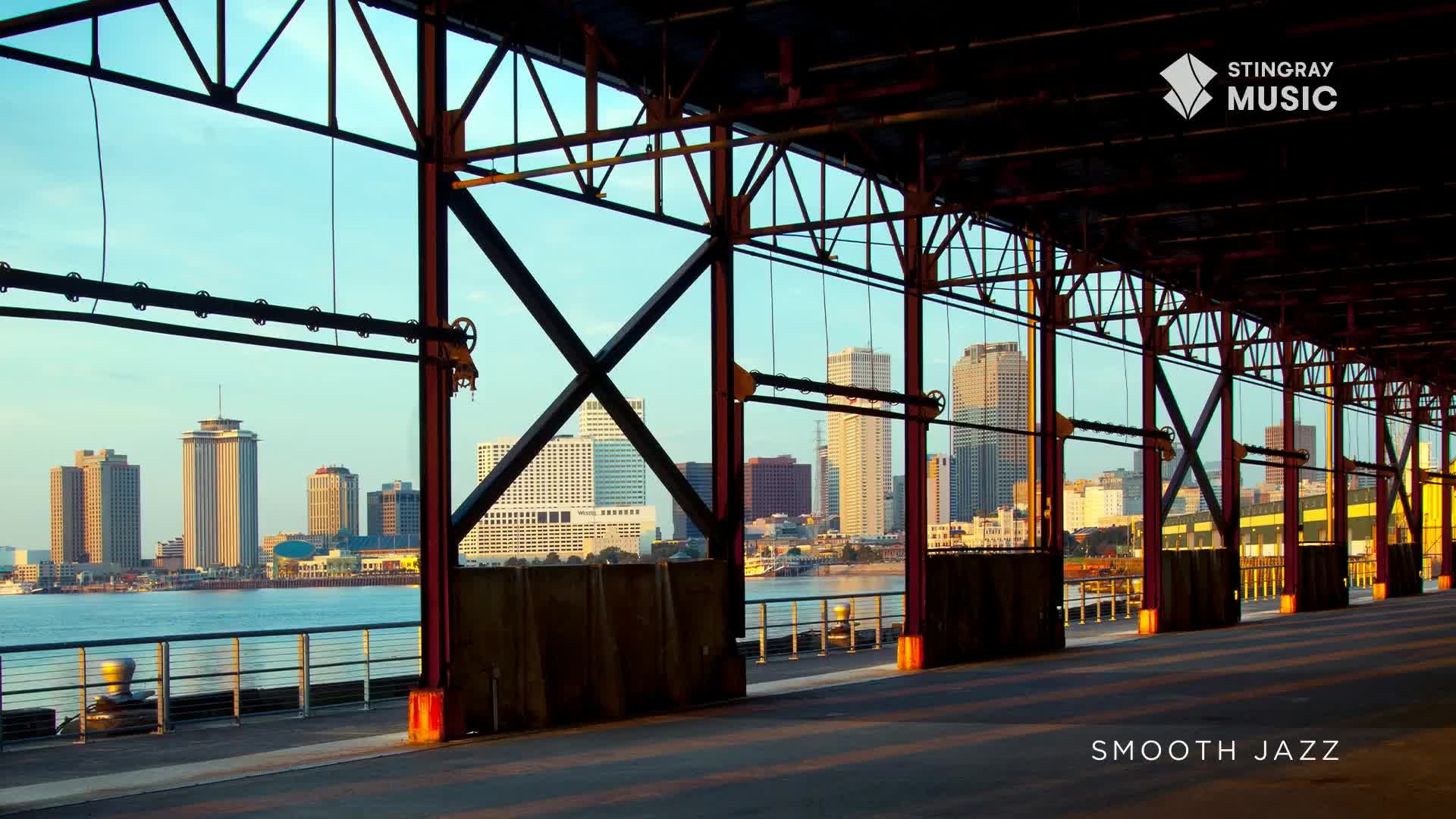 The sun casts long shadows across the waterfront as the New Orleans skyline rises beyond the river. A gentle breeze rustles through the industrial structure, carrying the faint sounds of smooth jazz. The sun casts long shadows across the waterfront as the New Orleans skyline rises beyond the river. A gentle breeze rustles through the industrial structure, carrying the faint sounds of smooth jazz.