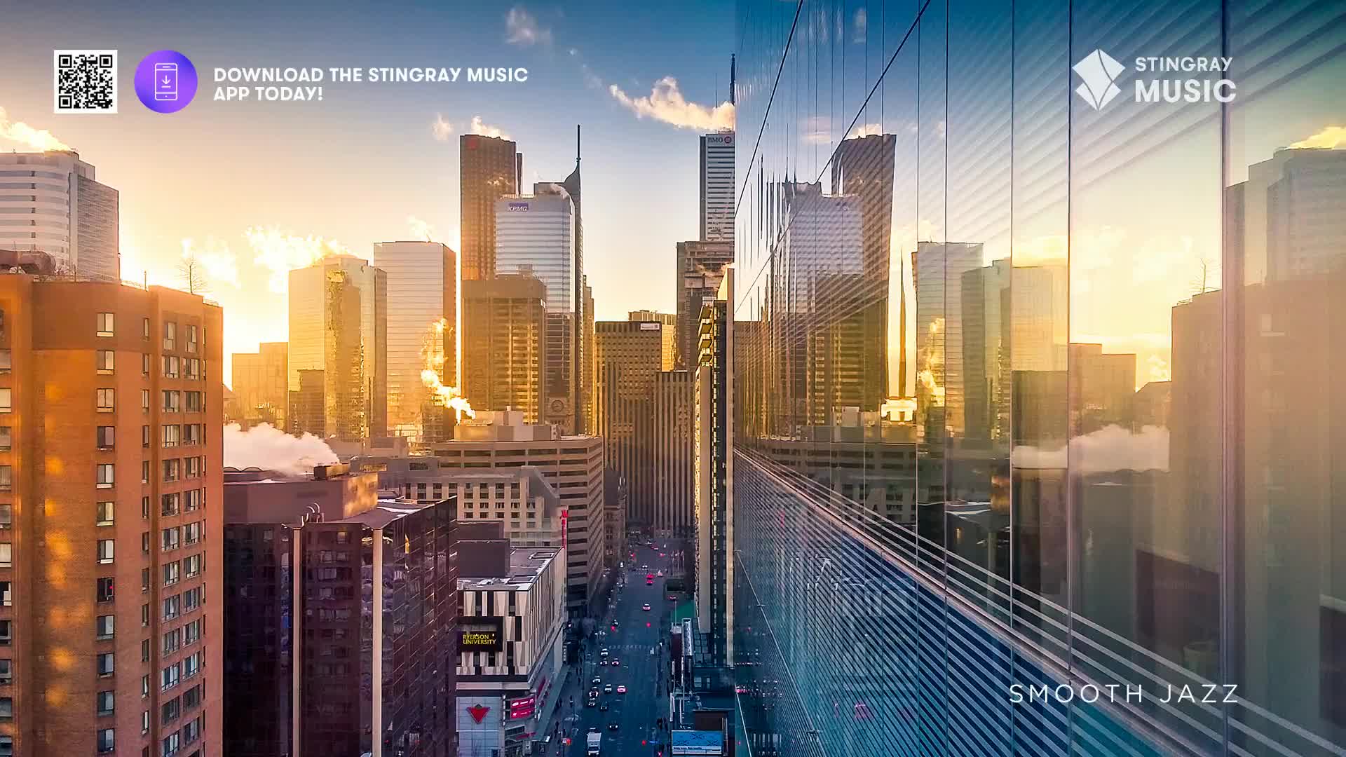 Sunlight glints off towering glass buildings in Toronto as cars move along the street below. The sky is a warm gradient of orange and blue, reflecting the city's energy.